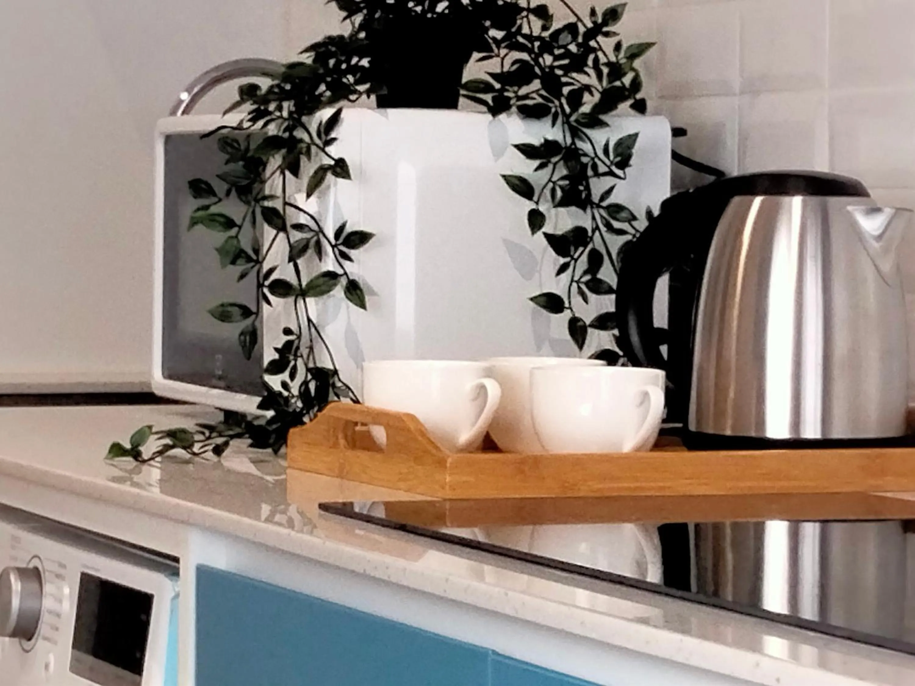 Kitchen or kitchenette in Continew Residence by HomeBrickz