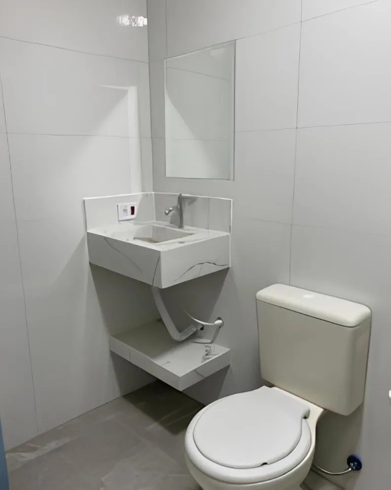 Bathroom in Hotel Ellos - Estacionamento e Café da Manhã Incluso