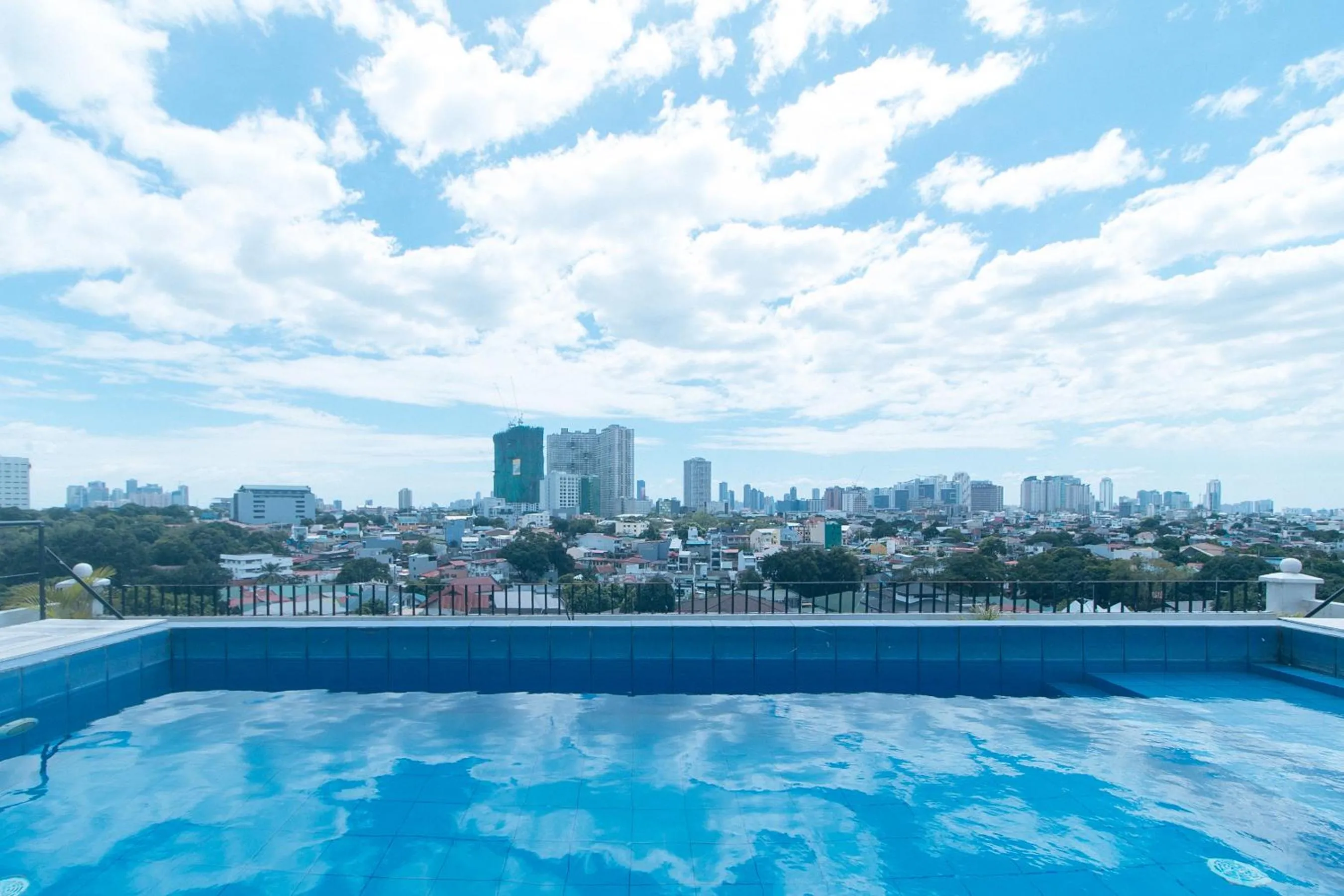 Day in 59 Xavierville by RedDoorz