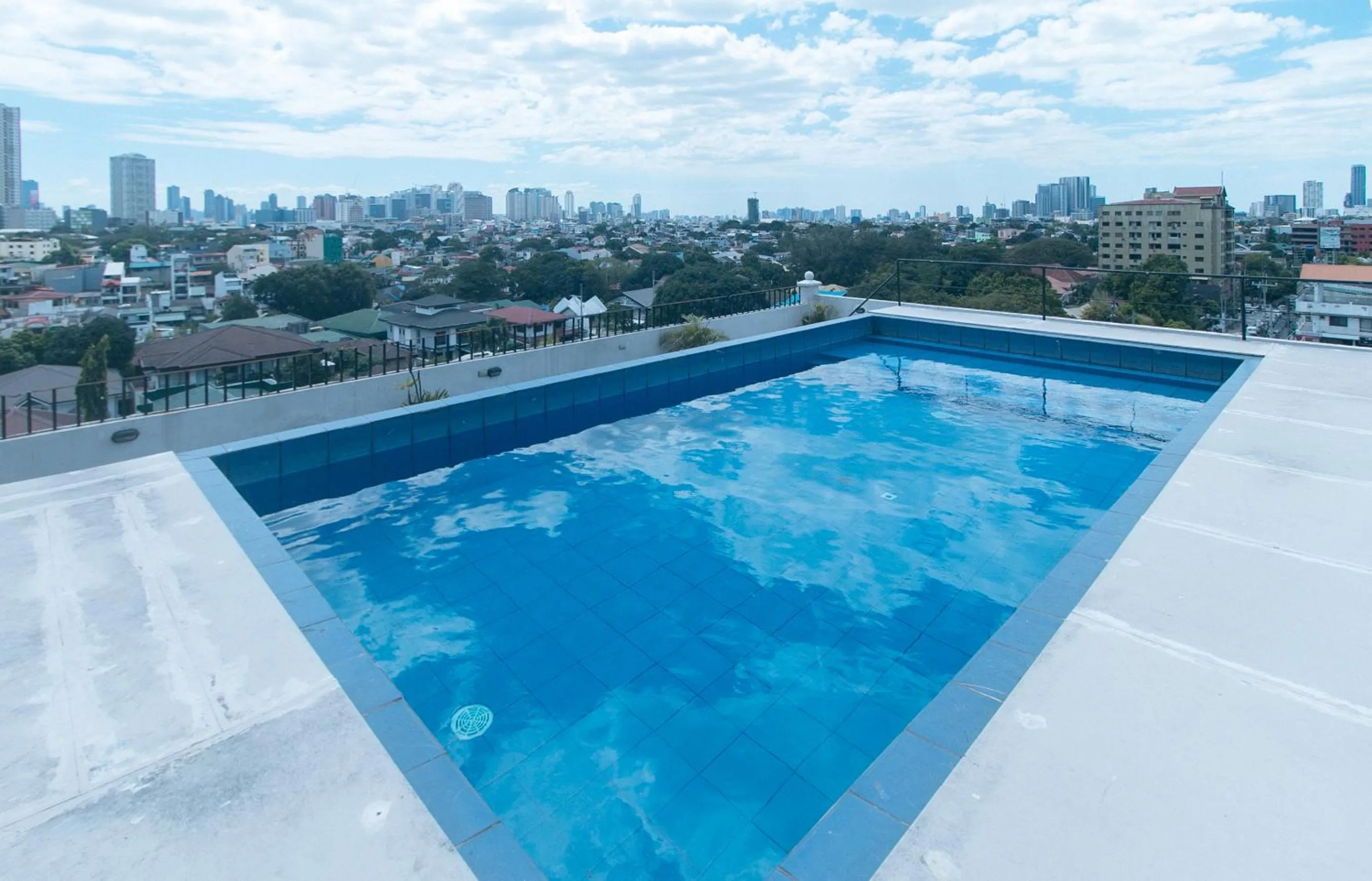 Pool view in 59 Xavierville by RedDoorz