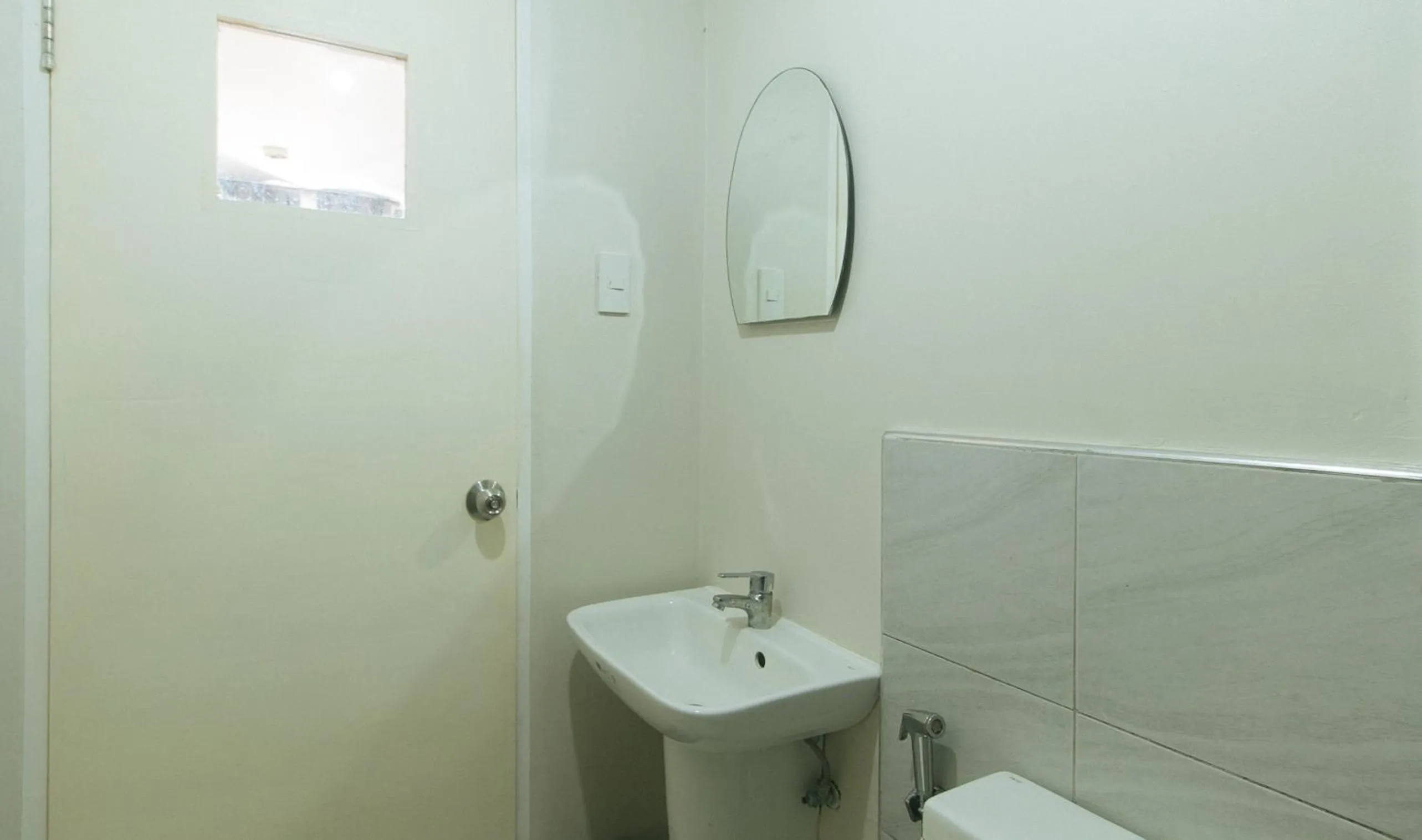 Shower in 59 Xavierville by RedDoorz