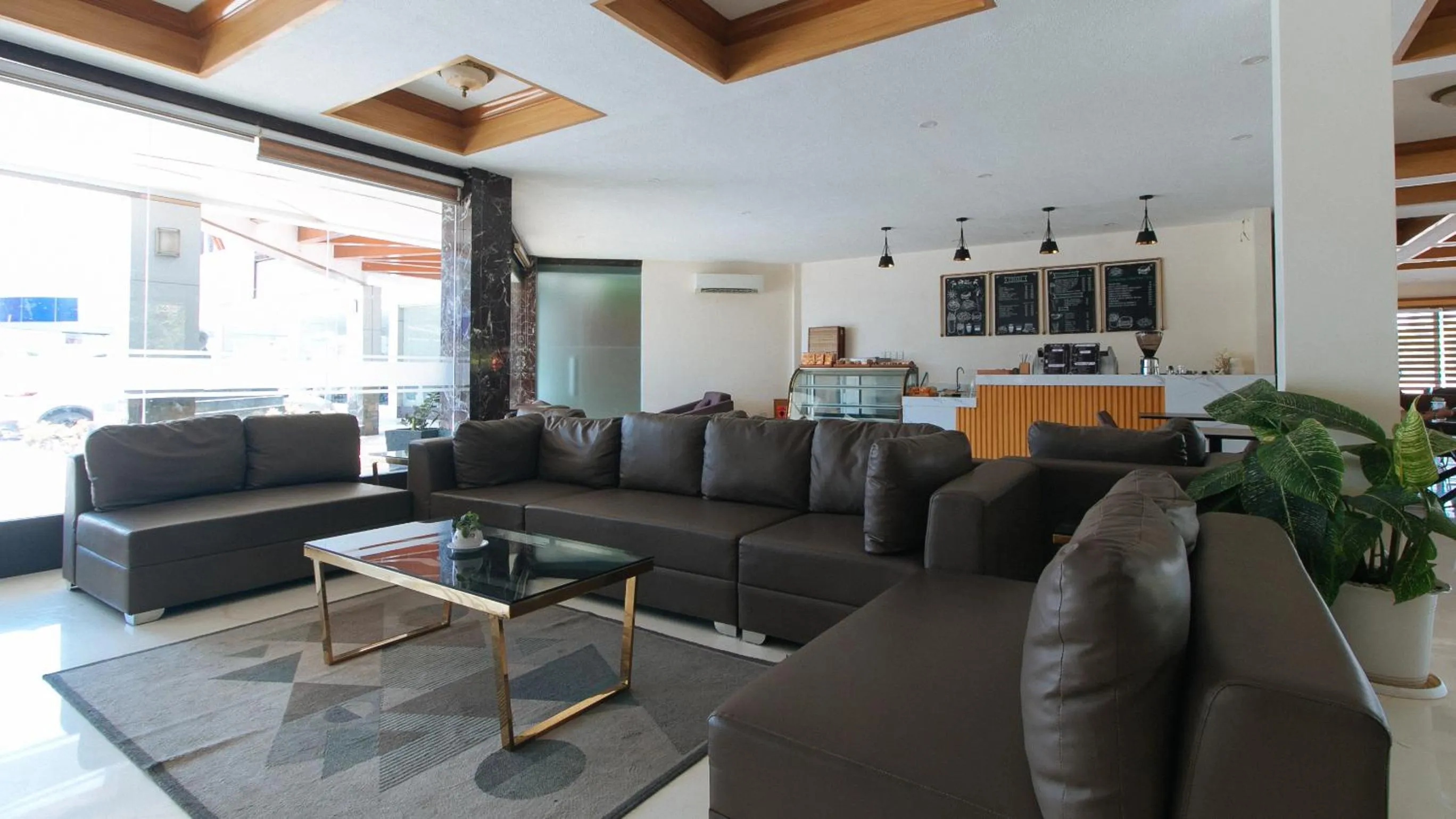 Living room in RedDoorz Premium @ Nick Hotel Gerona Tarlac