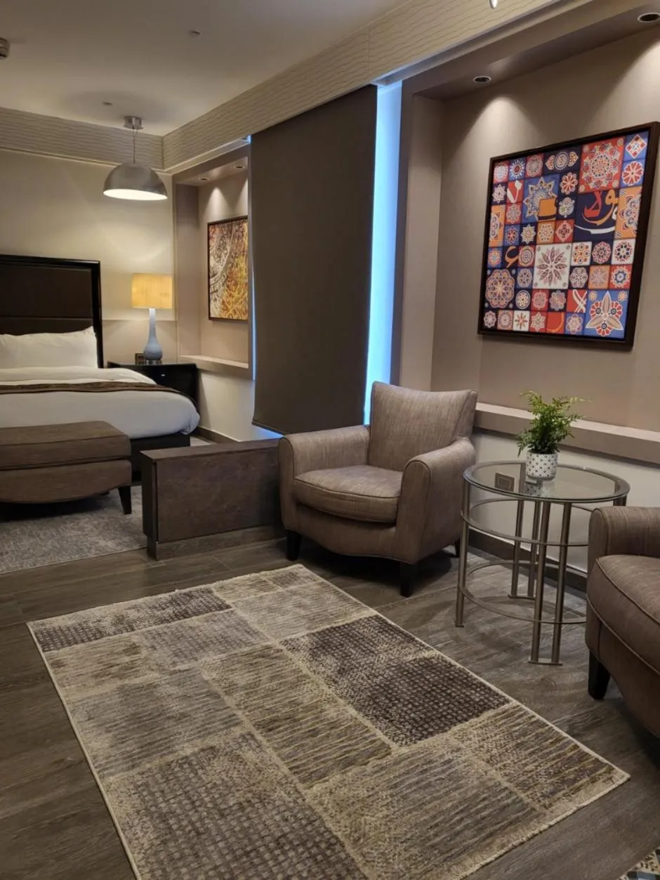 Bed in Ambassador, a Boutique Hotel