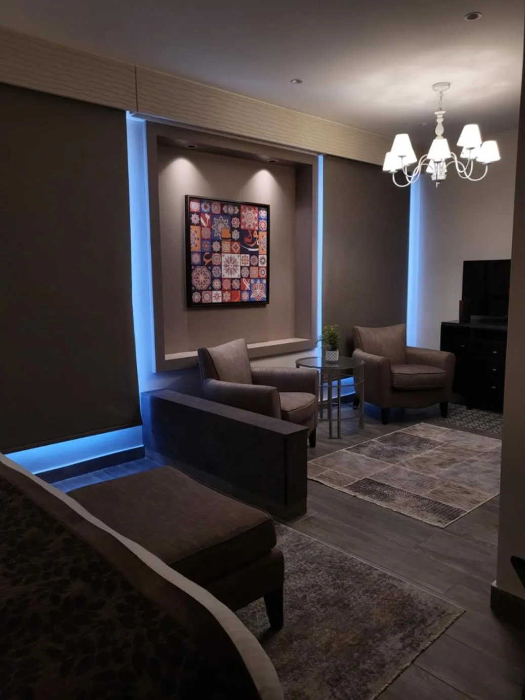 Communal lounge/ TV room in Ambassador, a Boutique Hotel