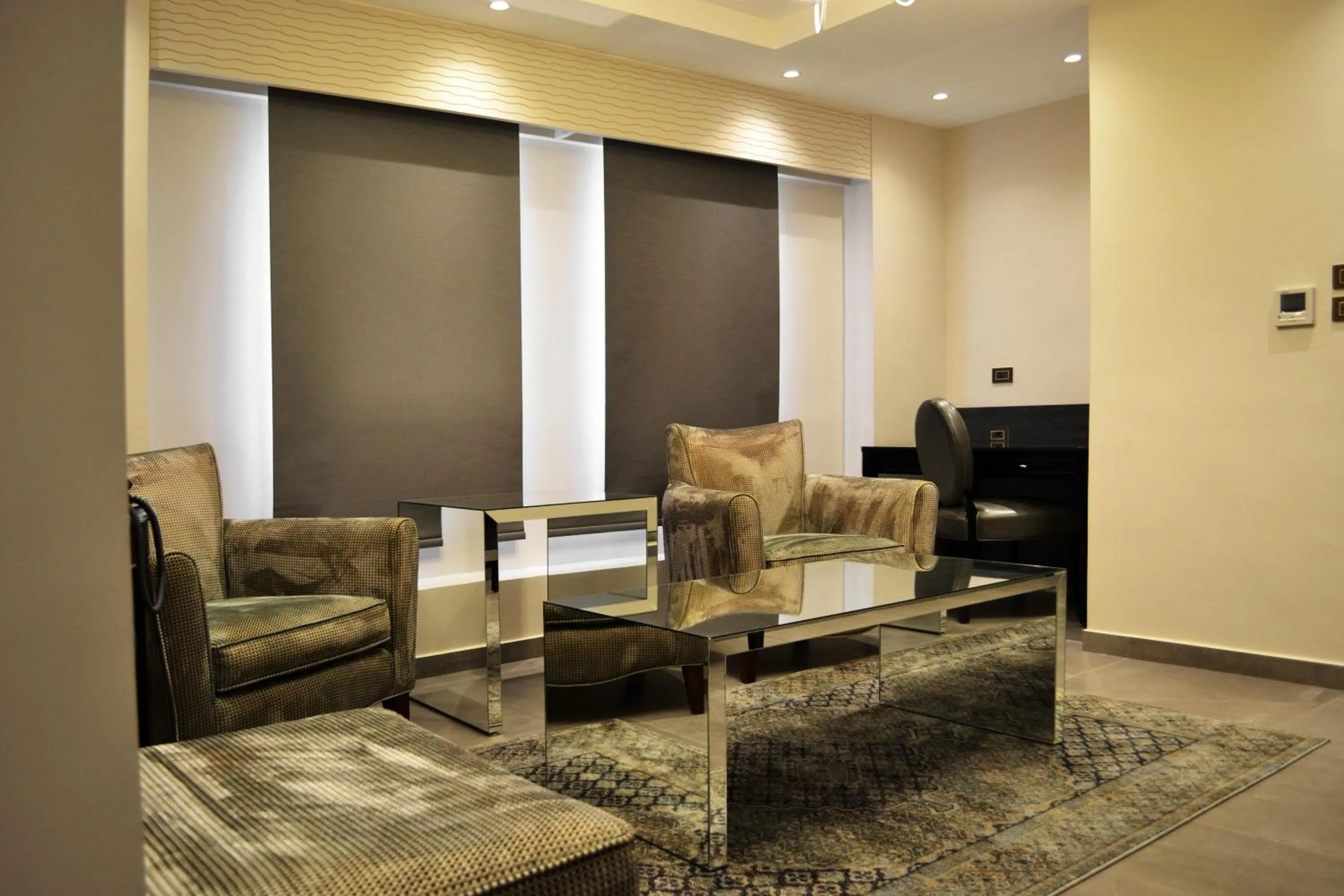 Living room in Ambassador, a Boutique Hotel