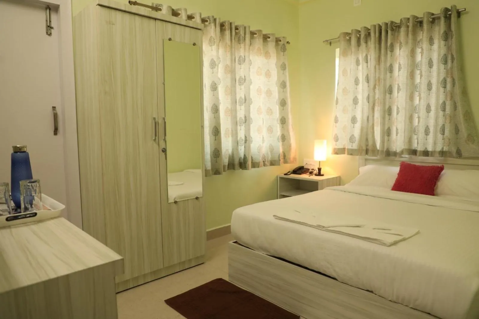 Bedroom, Bed in Sai Inn Mysore