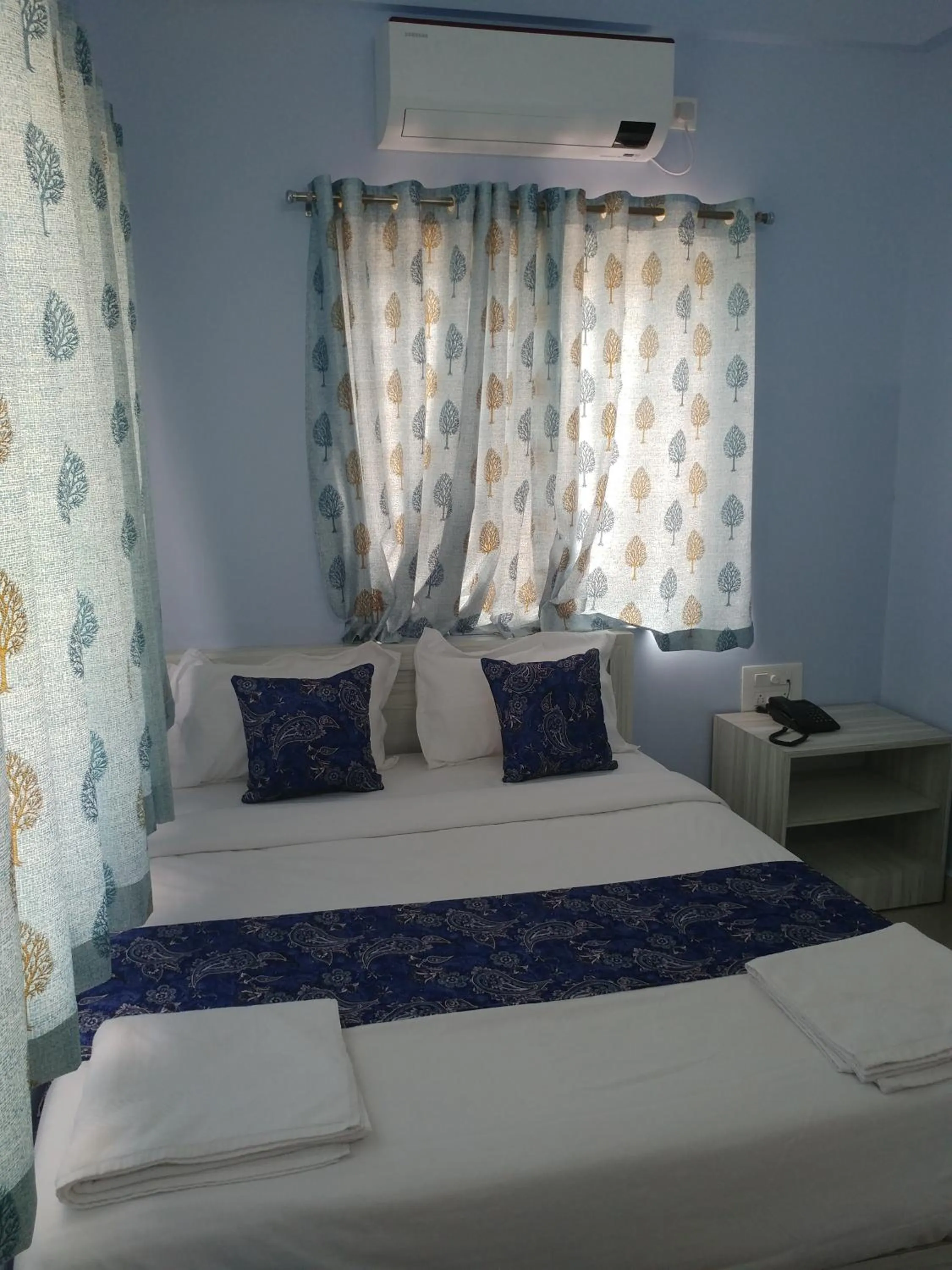 Bedroom, Bed in Sai Inn Mysore