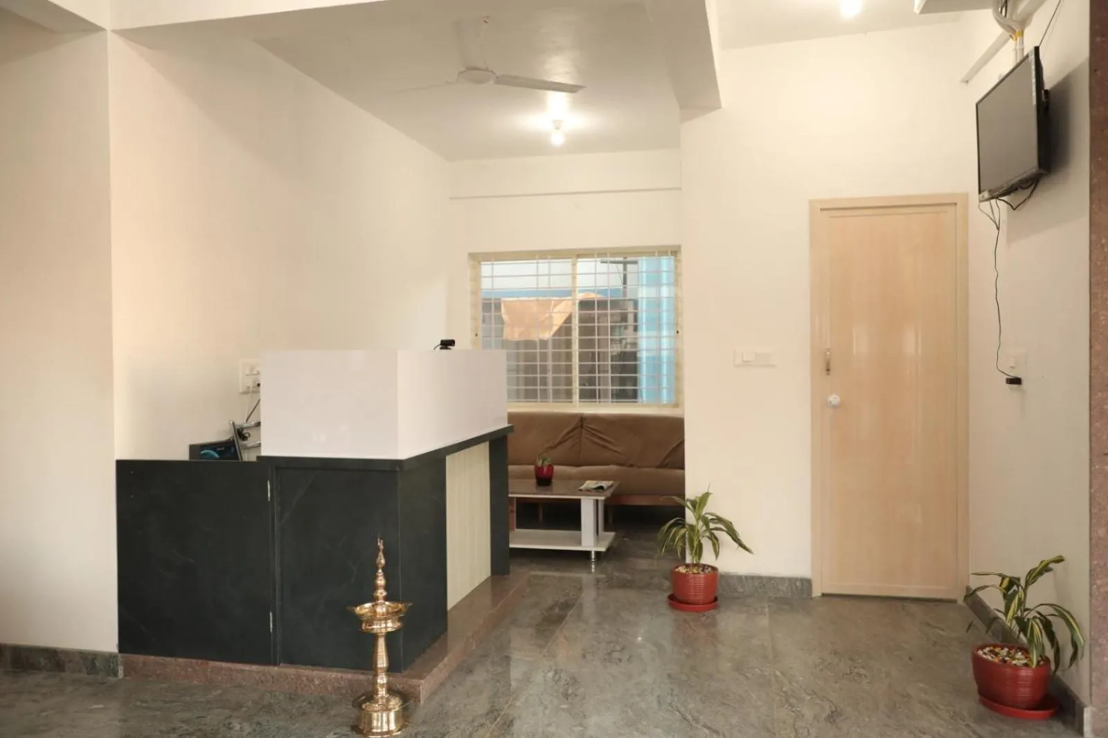 Lobby or reception in Sai Inn Mysore