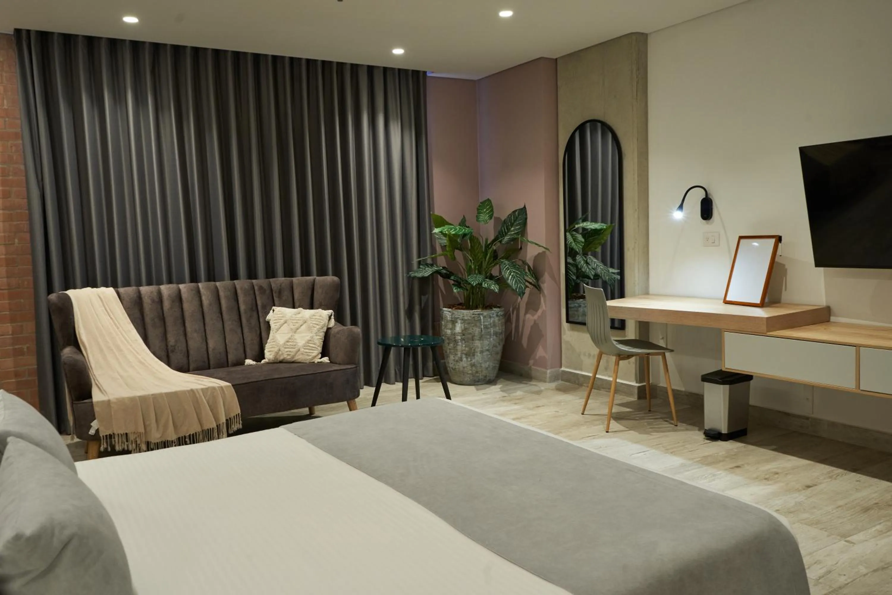 Photo of the whole room, Bed in Eutopiq Hotel