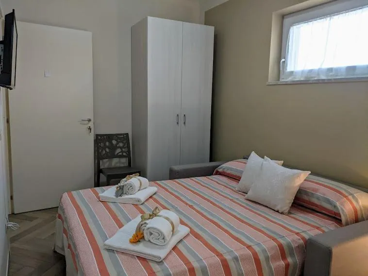 Bed in Il Giglio Marino Cilento Residence by ElodeaGroup