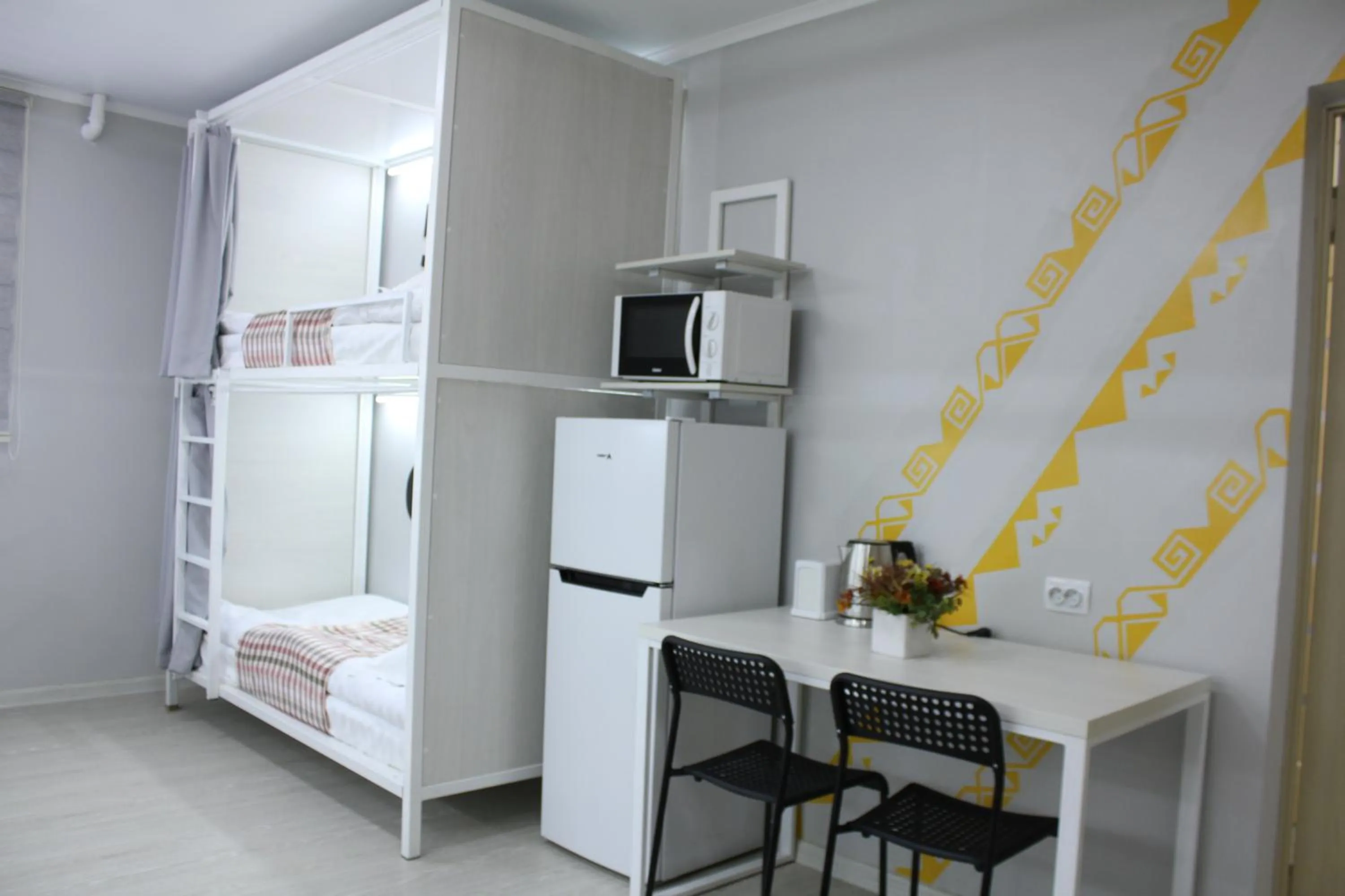 Kitchen or kitchenette, Bed in Viva Hotel