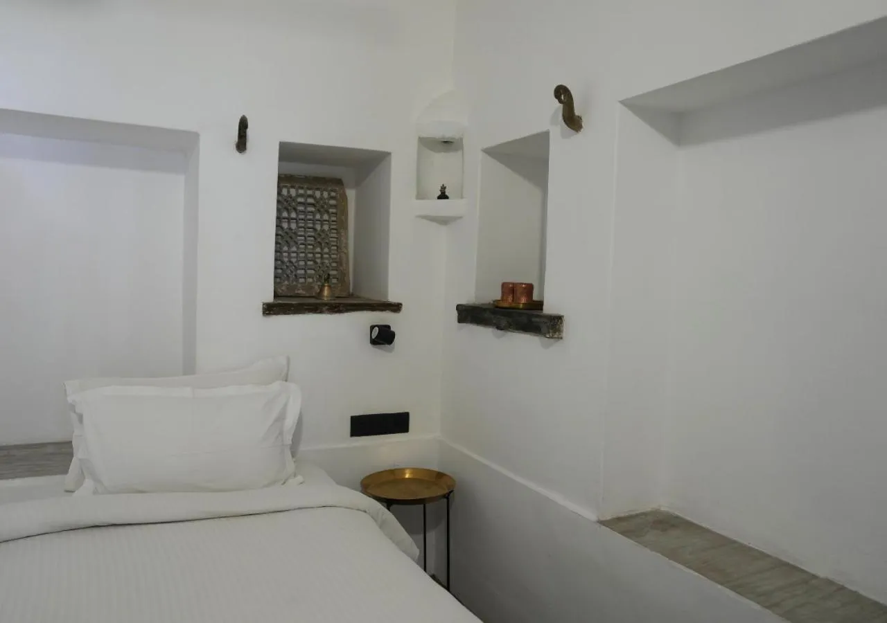 Bed in Little Garden Guest House