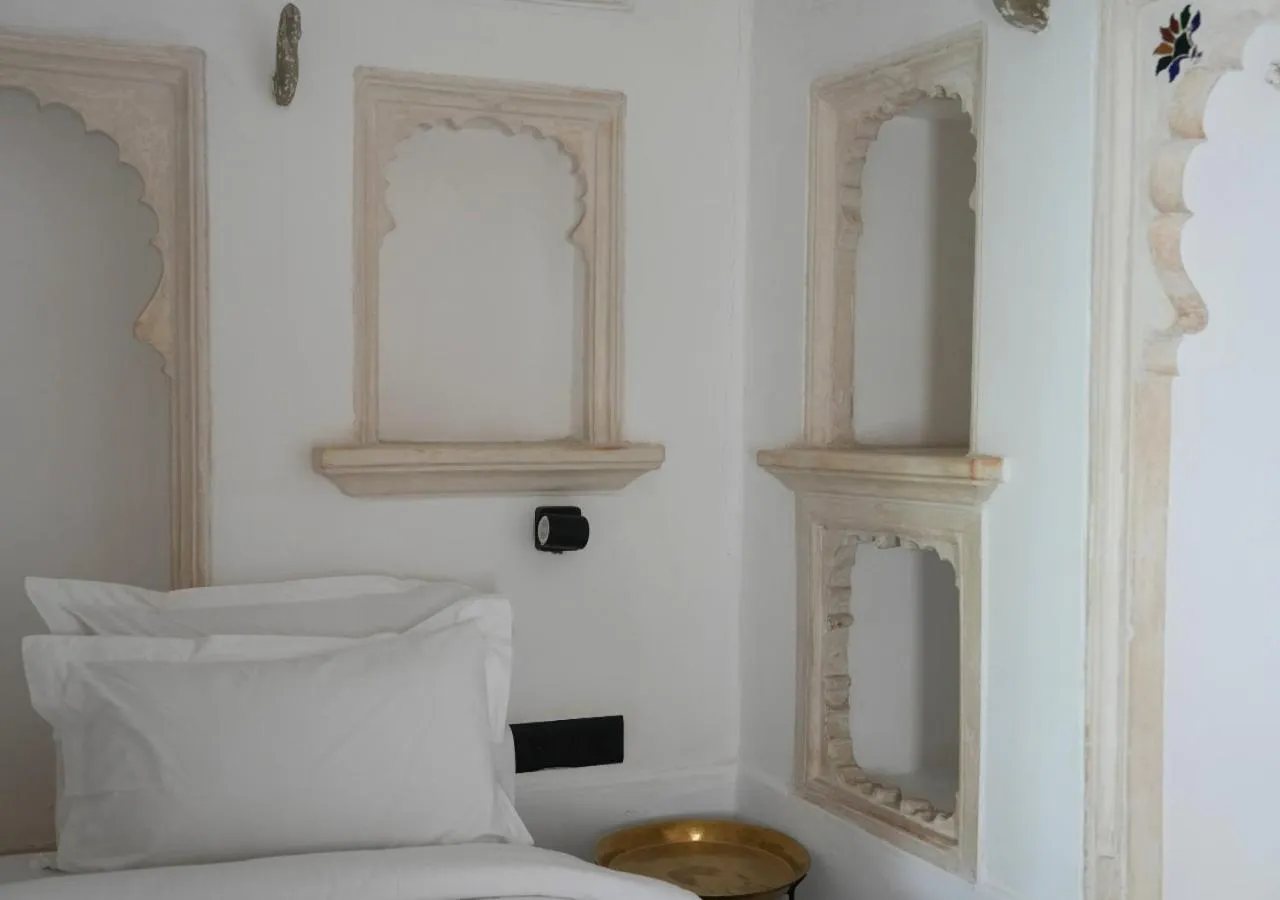 Decorative detail, Bed in Little Garden Guest House