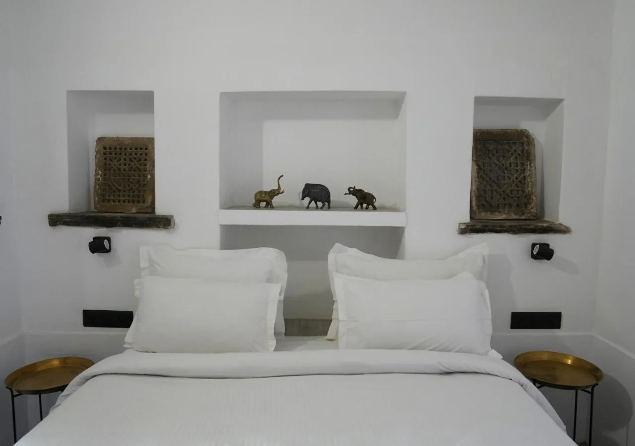 Bed in Little Garden Guest House