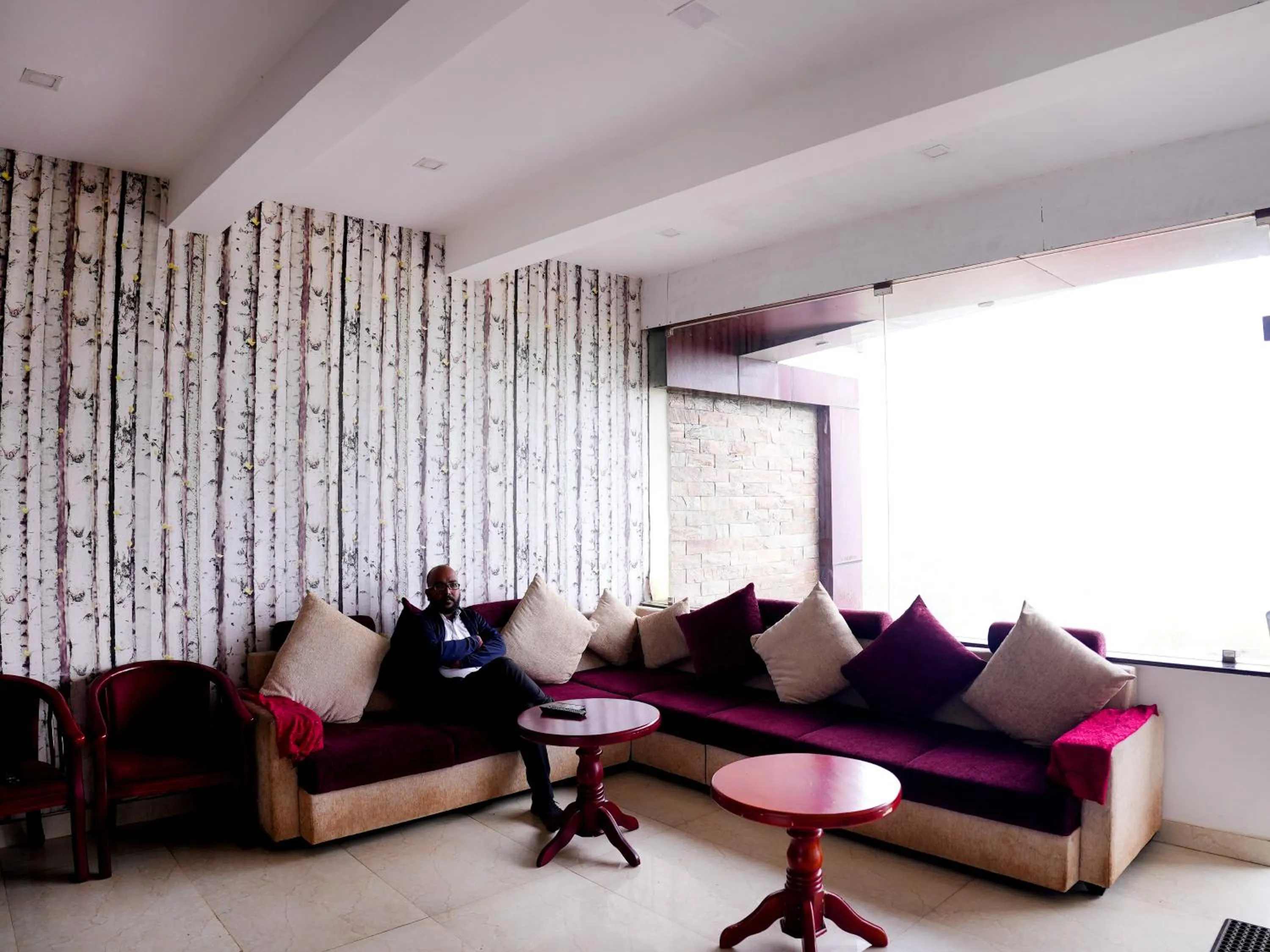 Seating area in Vista Suites Doddabetta Ooty By Bestinn Leisure