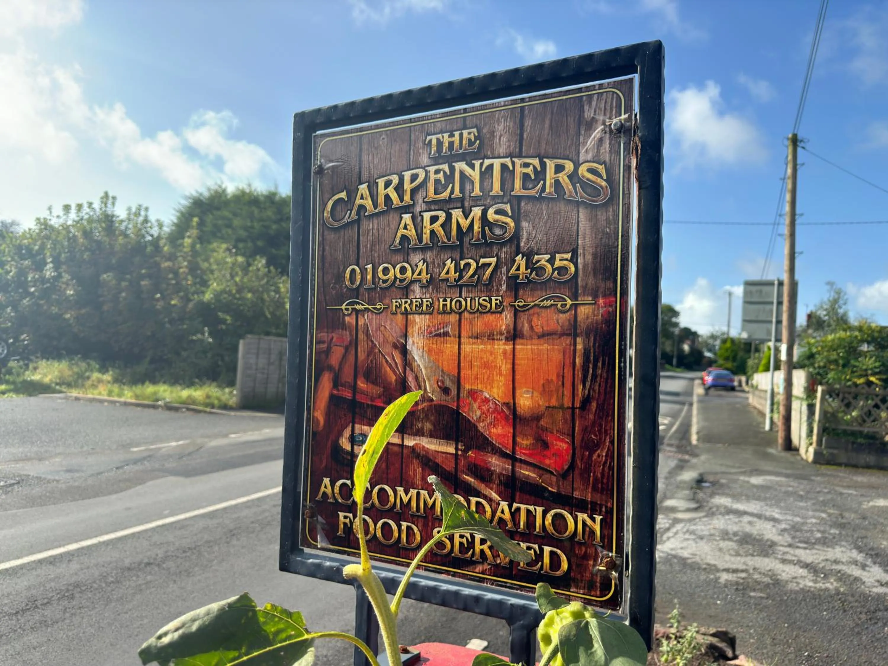 Logo/Certificate/Sign in The Carpenters Arms Rooms in Broadway, Laugharne