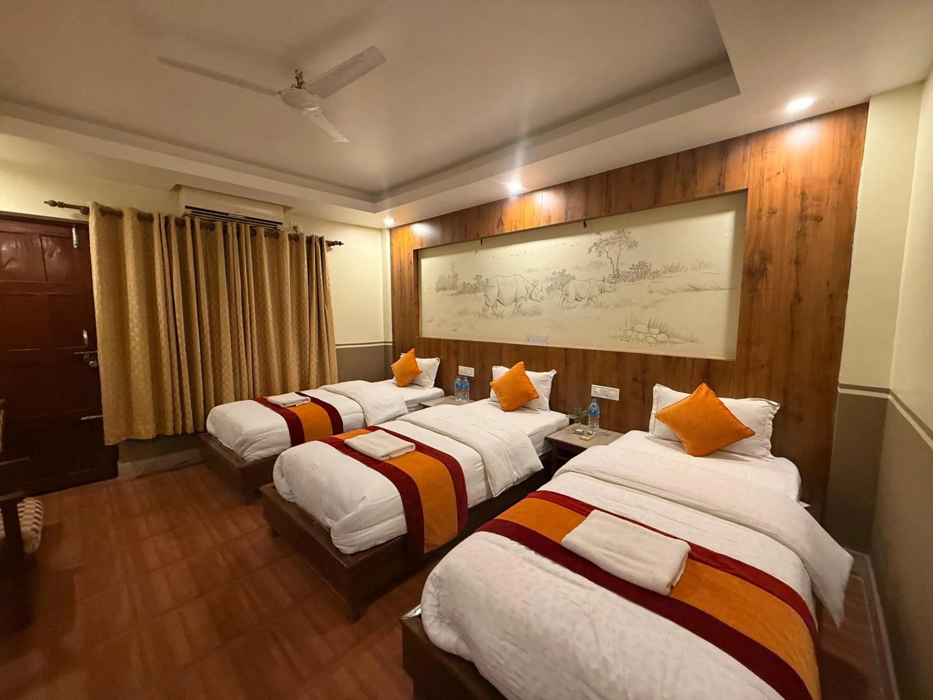 Bed in Jungle Safari Resort