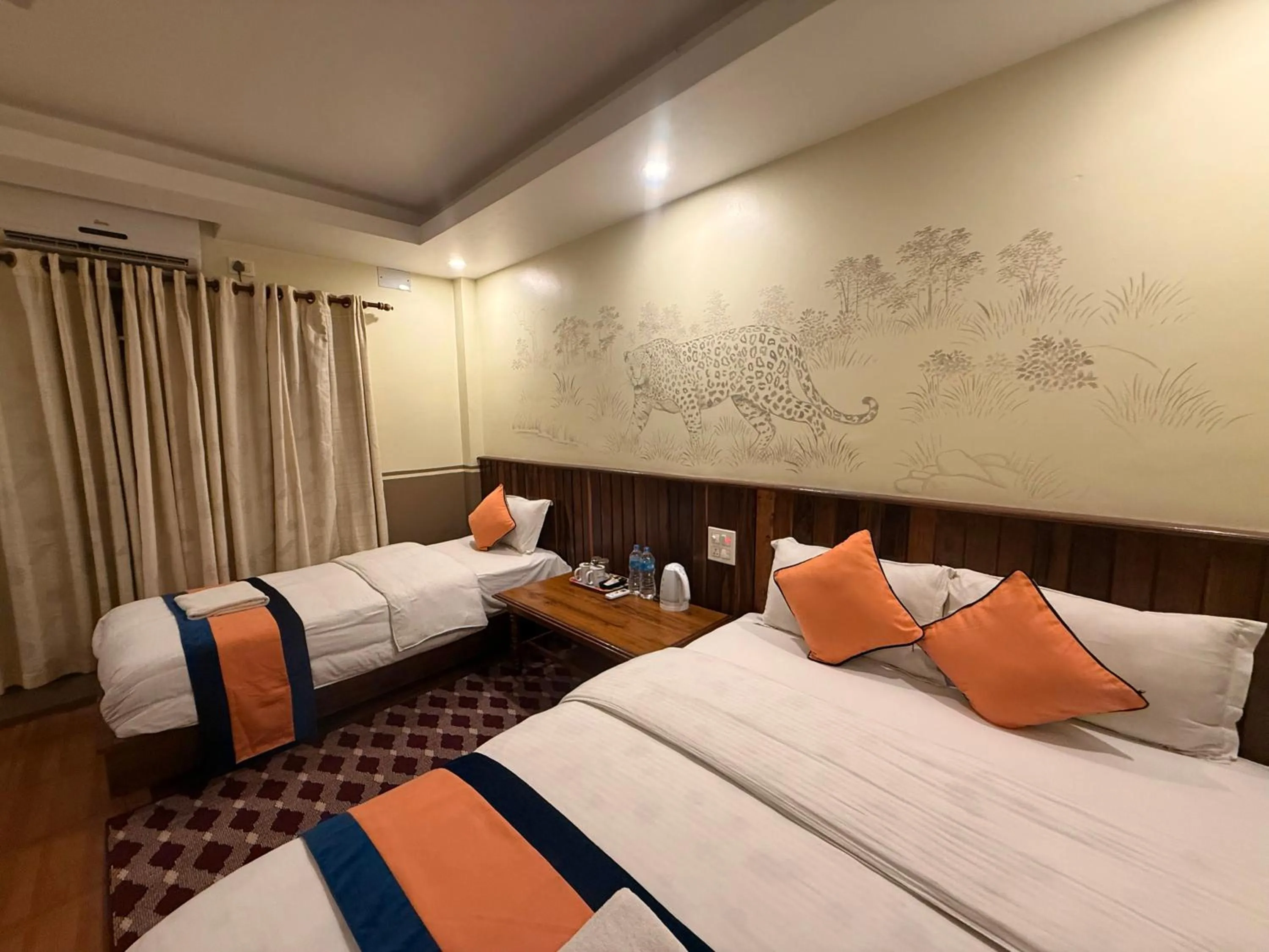 Bed in Jungle Safari Resort