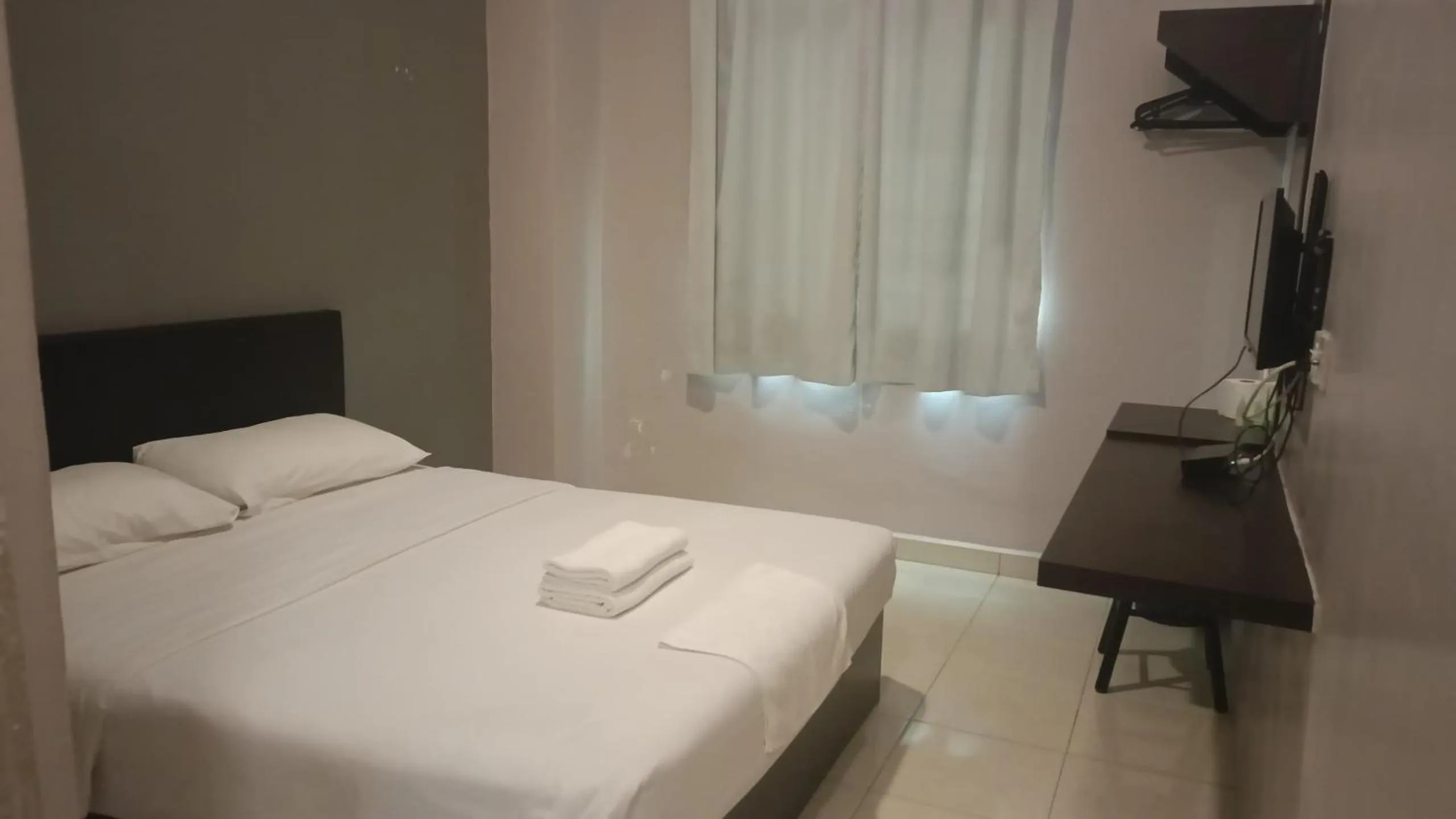 Photo of the whole room, Bed in CK Hotel - Self Check In