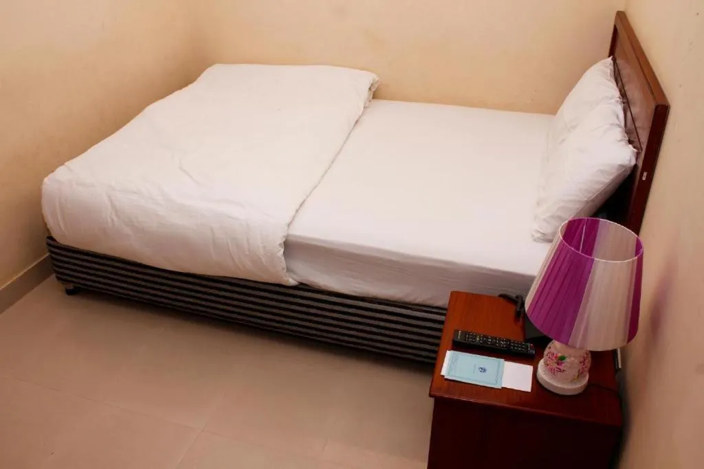 Bed in Lighthouse Family Retreat