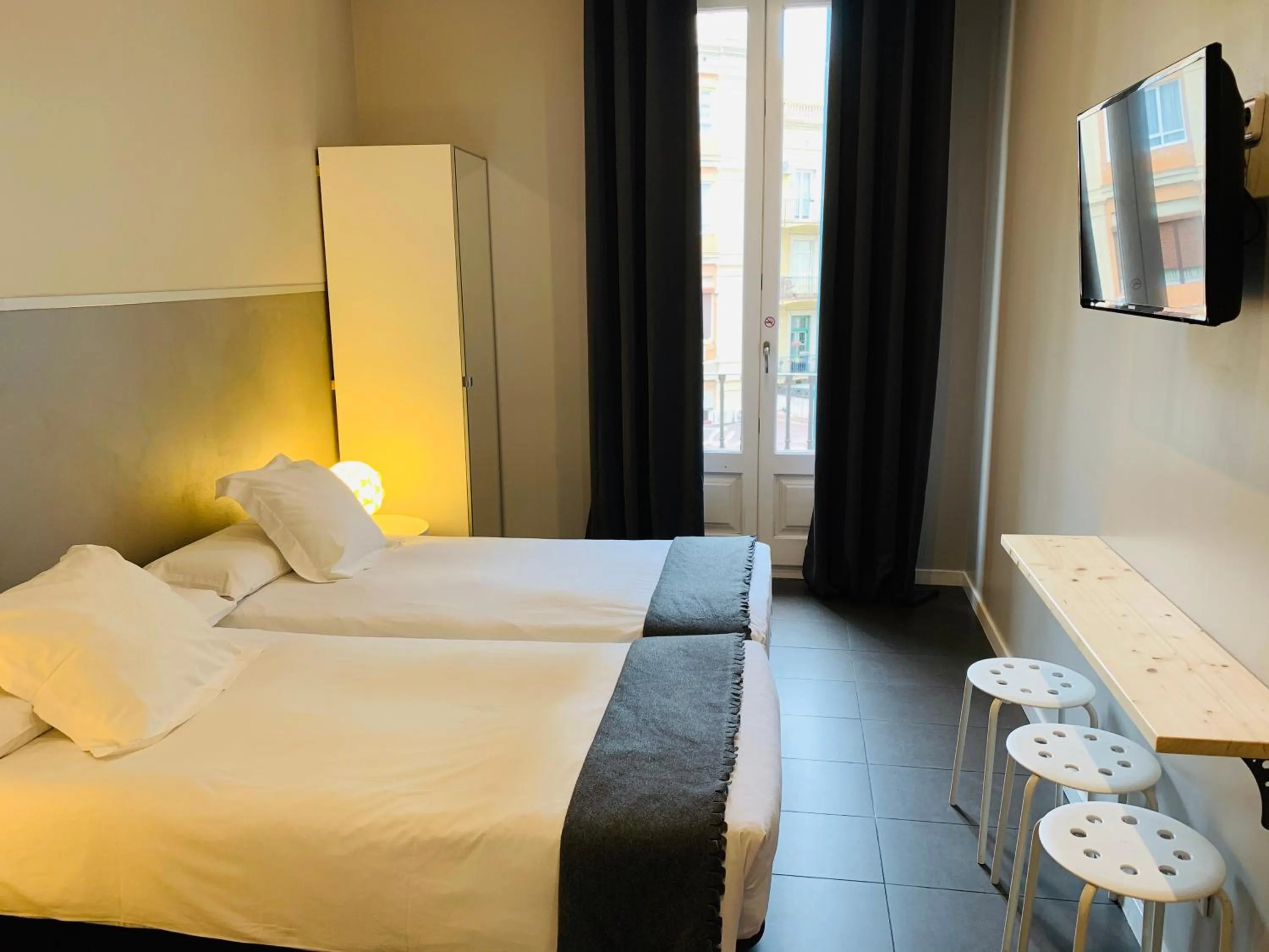 Bed in Super Balmes Guest House