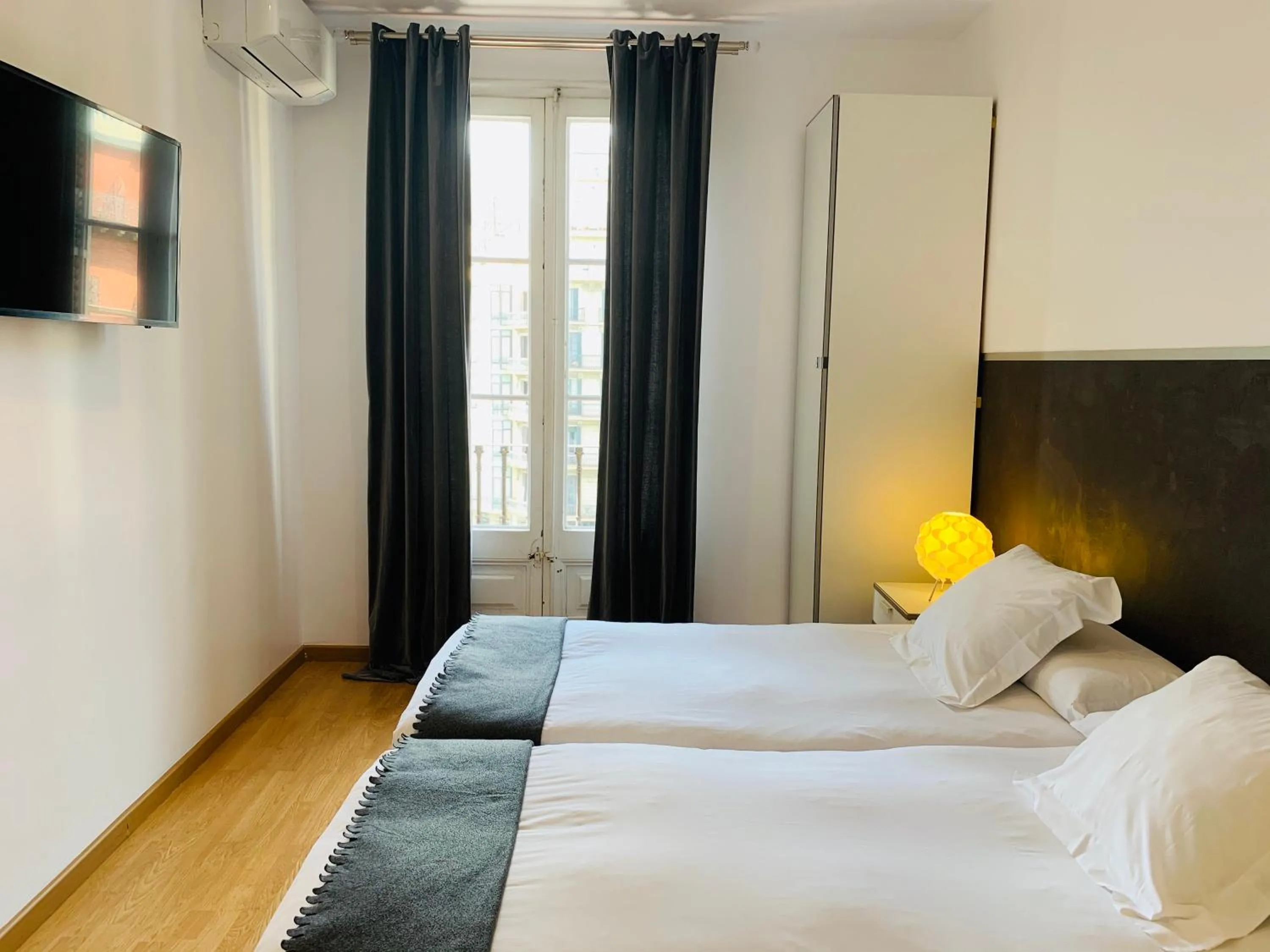 Bed in Super Balmes Guest House