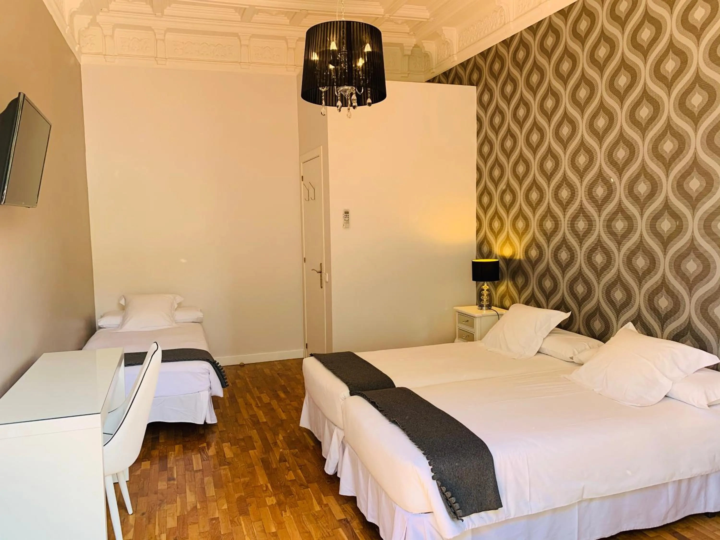 Bed in Super Balmes Guest House