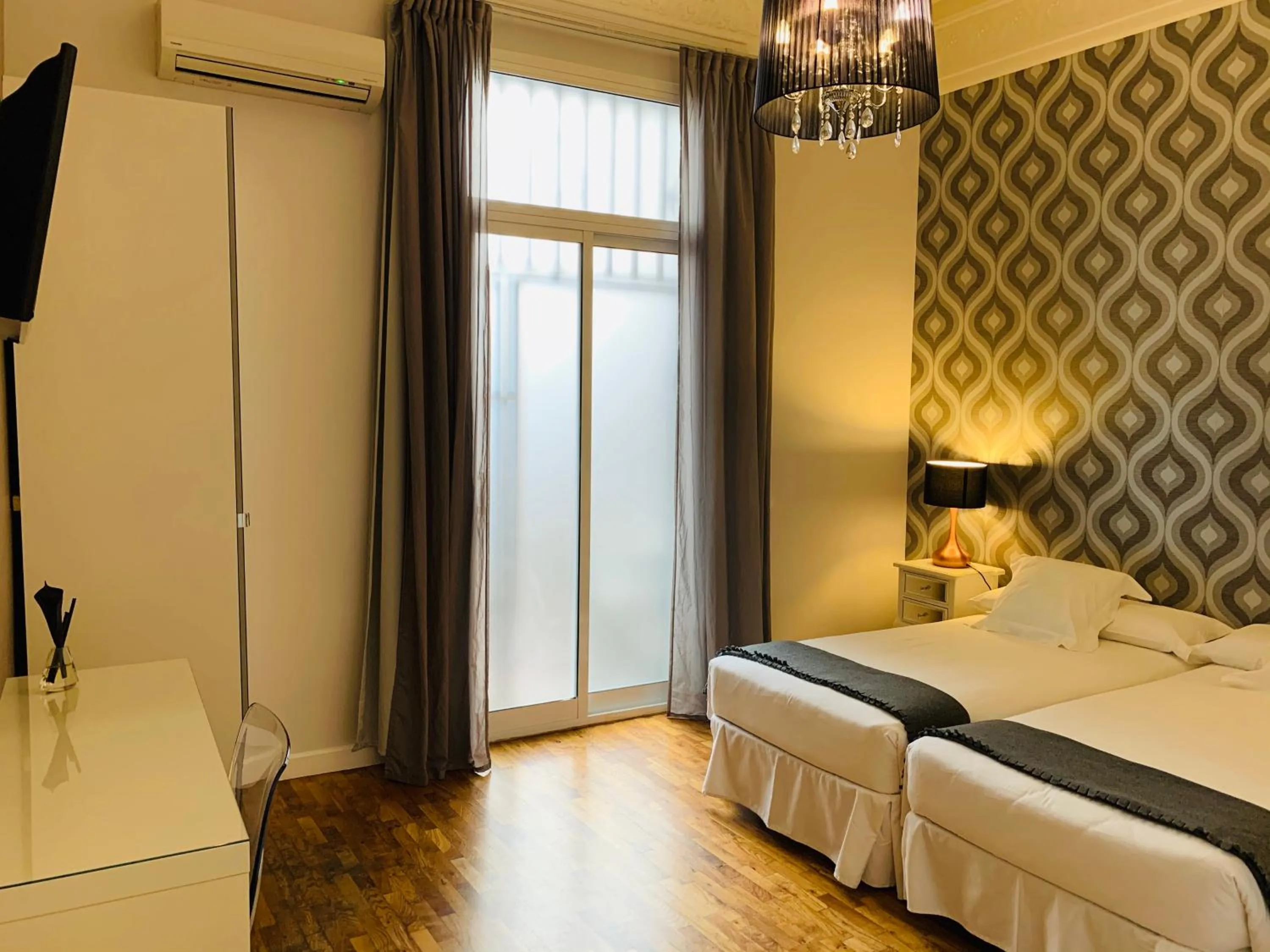 Bed in Super Balmes Guest House