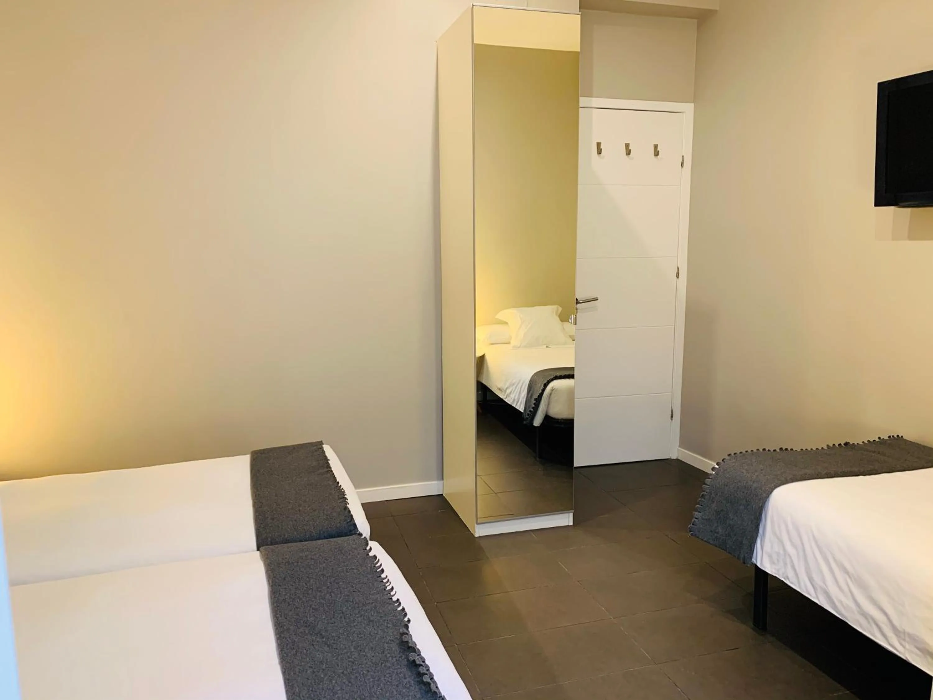 Bed in Super Balmes Guest House