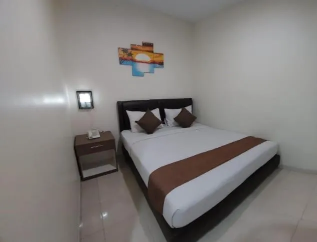 Bed in Grand Avira Hotel