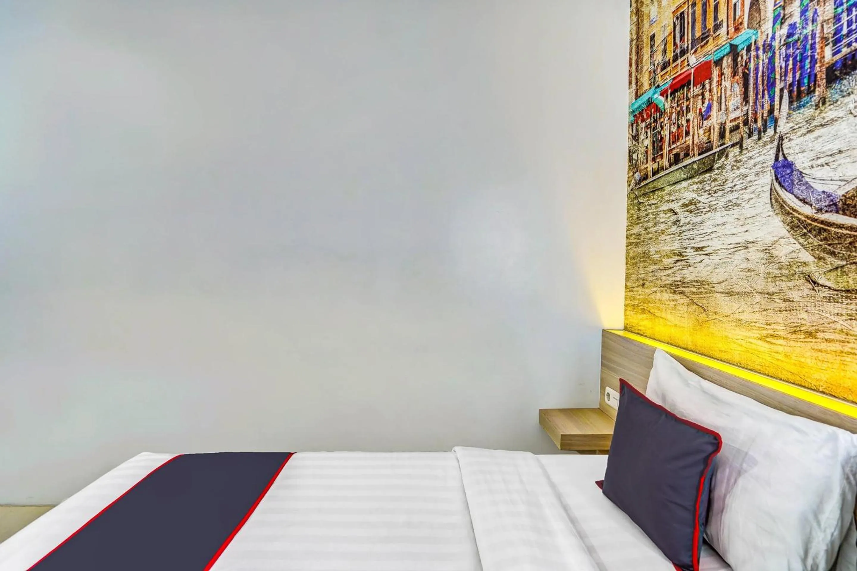 Bedroom in Capital O 90888 Bintang Diponggo Residence