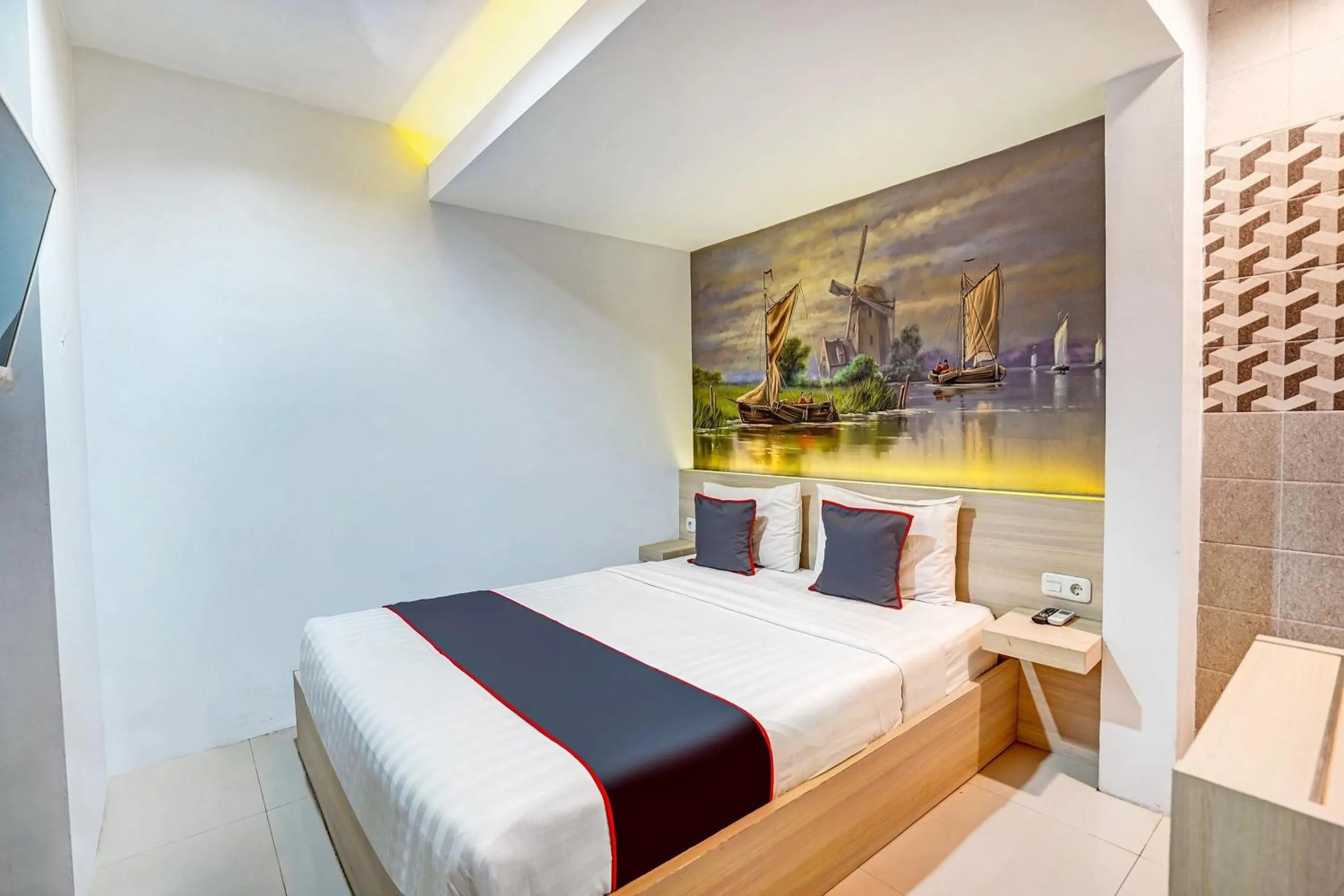 Bedroom in Capital O 90888 Bintang Diponggo Residence