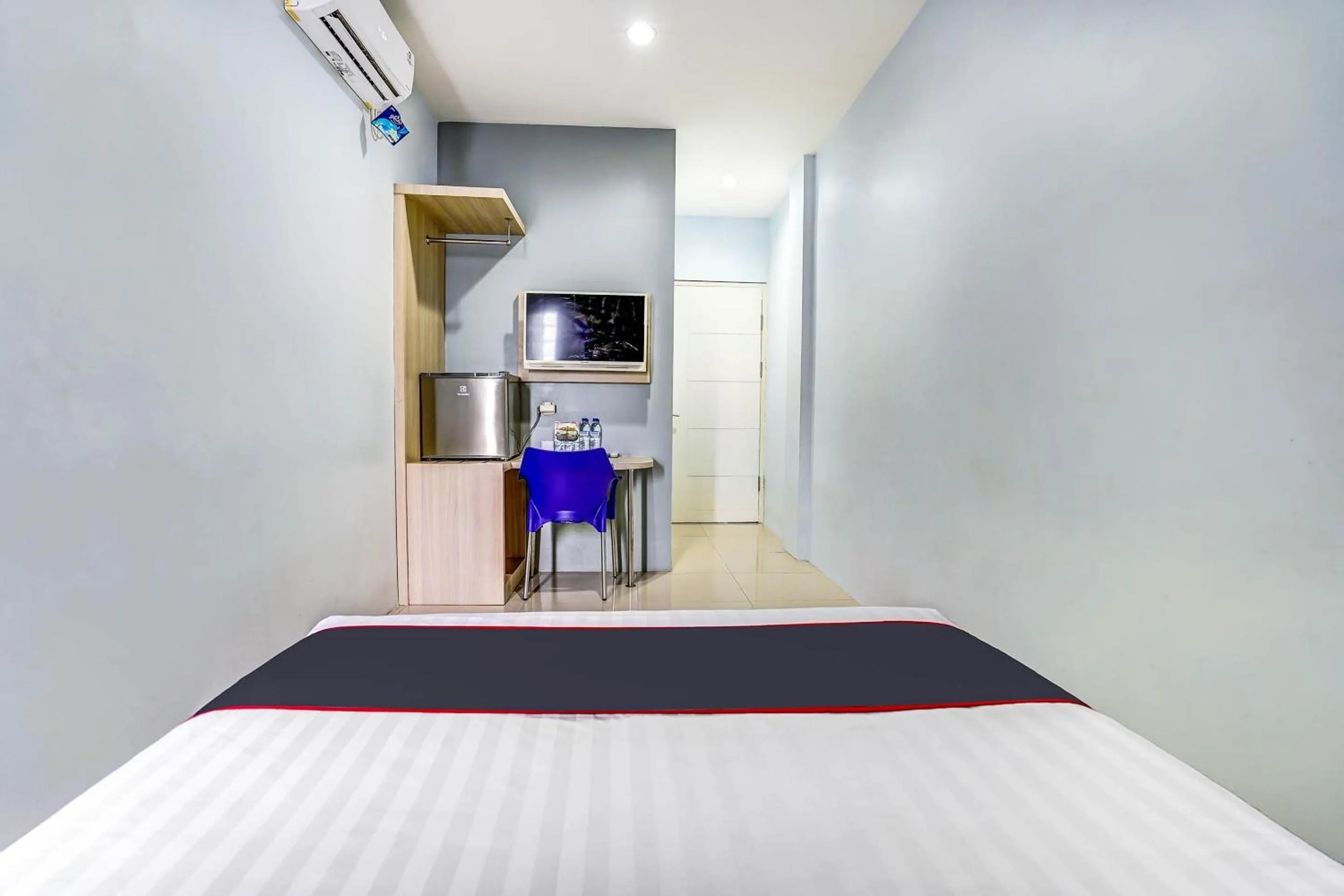 Bedroom in Capital O 90888 Bintang Diponggo Residence