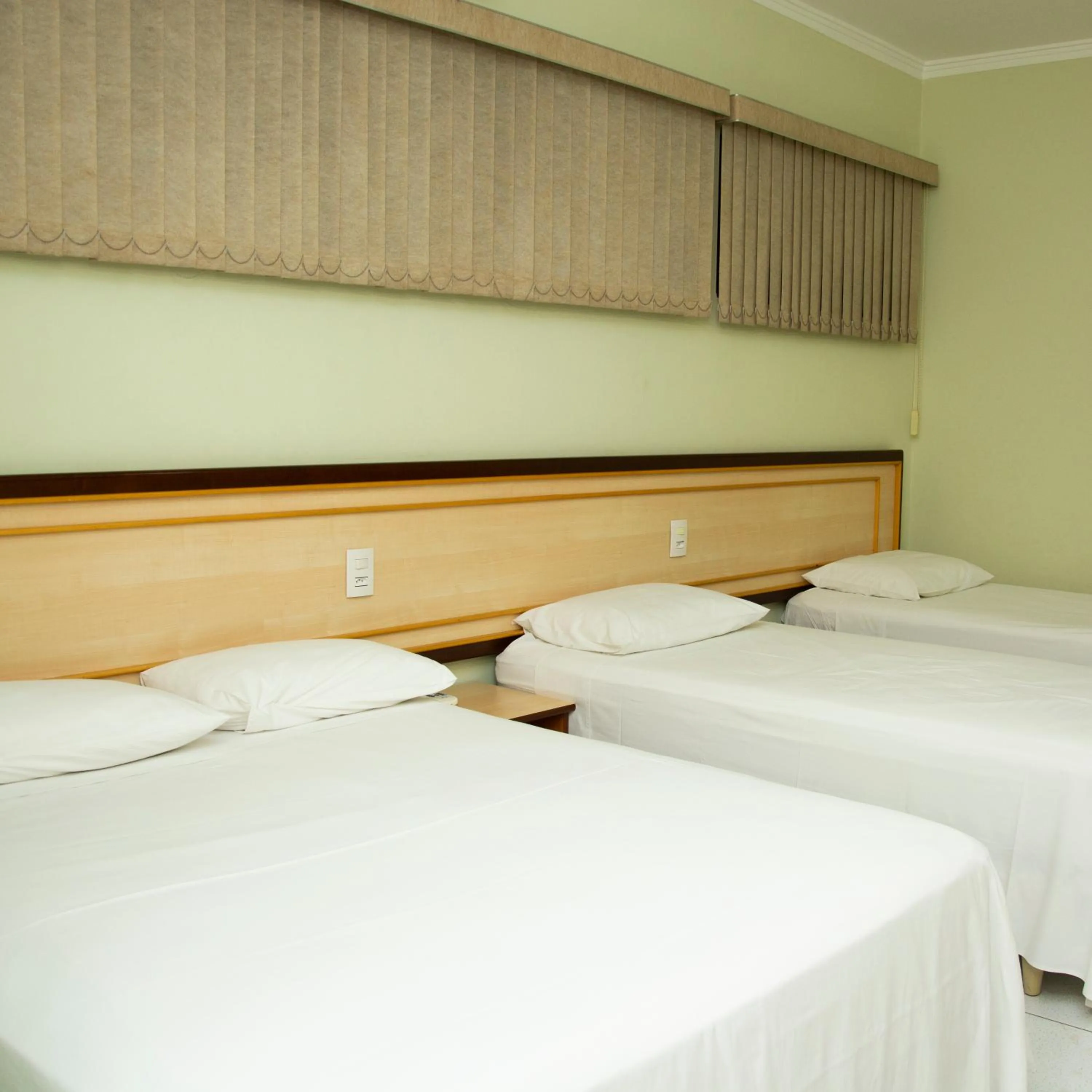 Bed in Larison Ji-Paraná by - Easy Hotéis