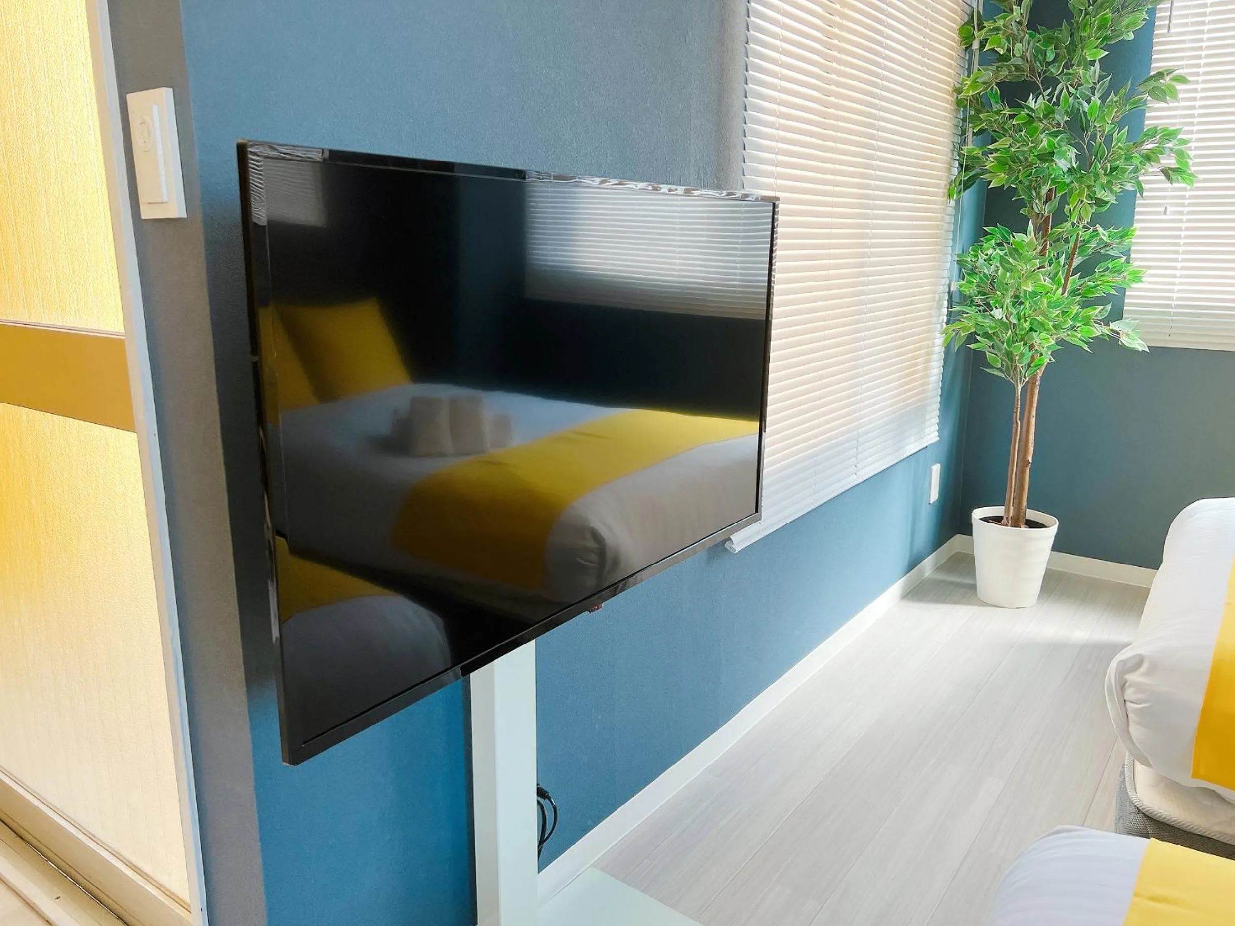 Bed in OUCHI HOTEL Nagarekawa with Dogs