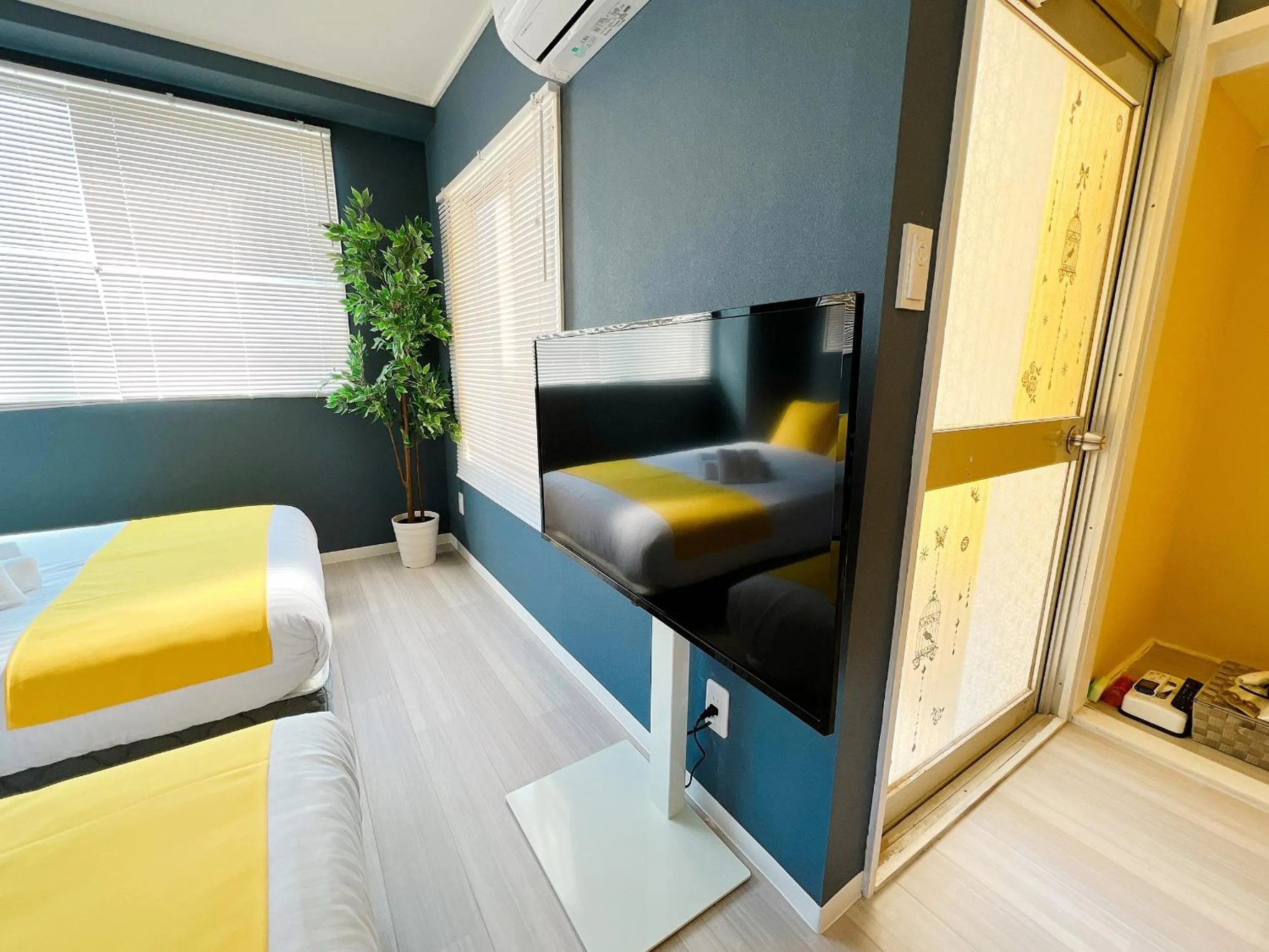 Bed in OUCHI HOTEL Nagarekawa with Dogs