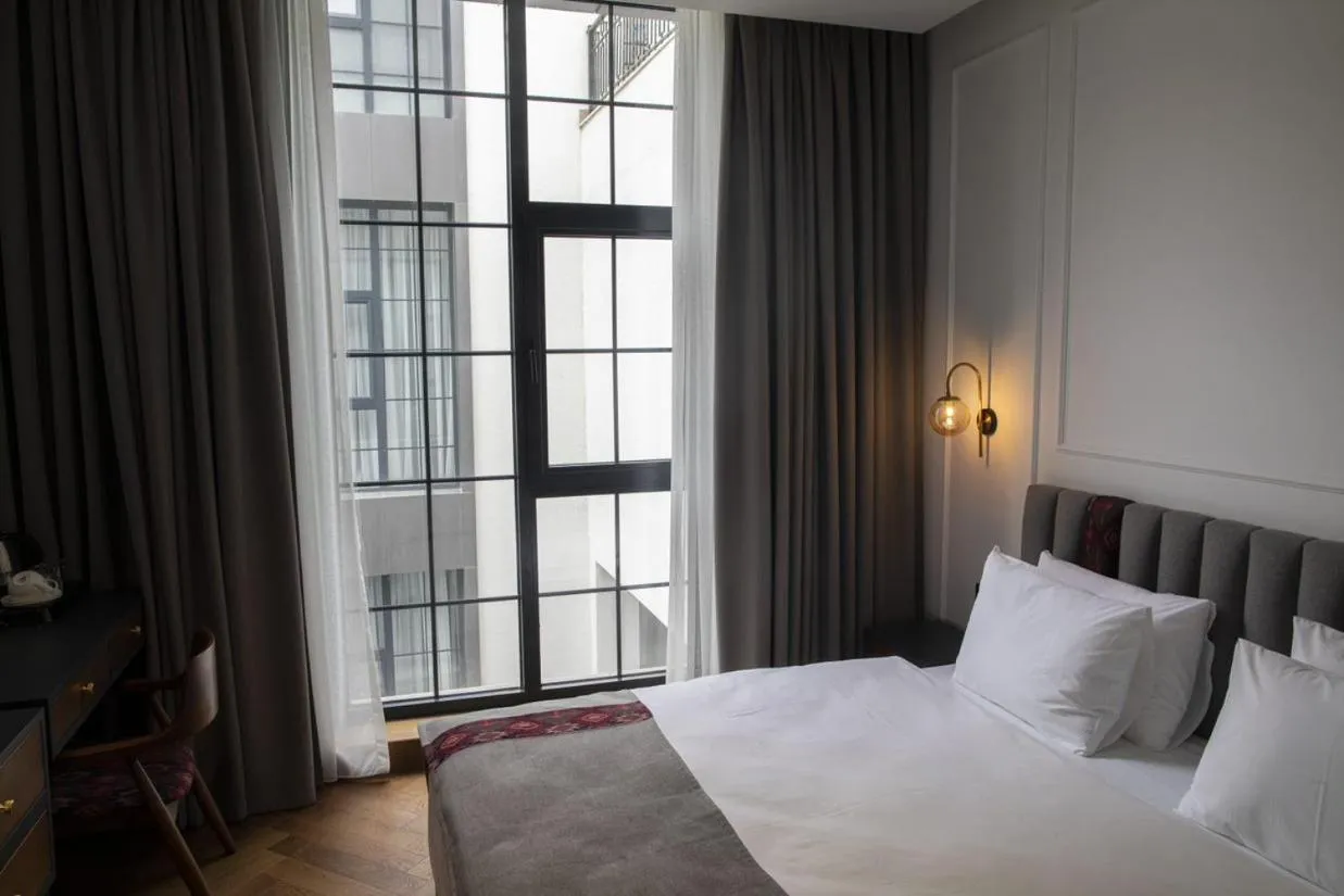 Bed in Molokan Inn Hotel