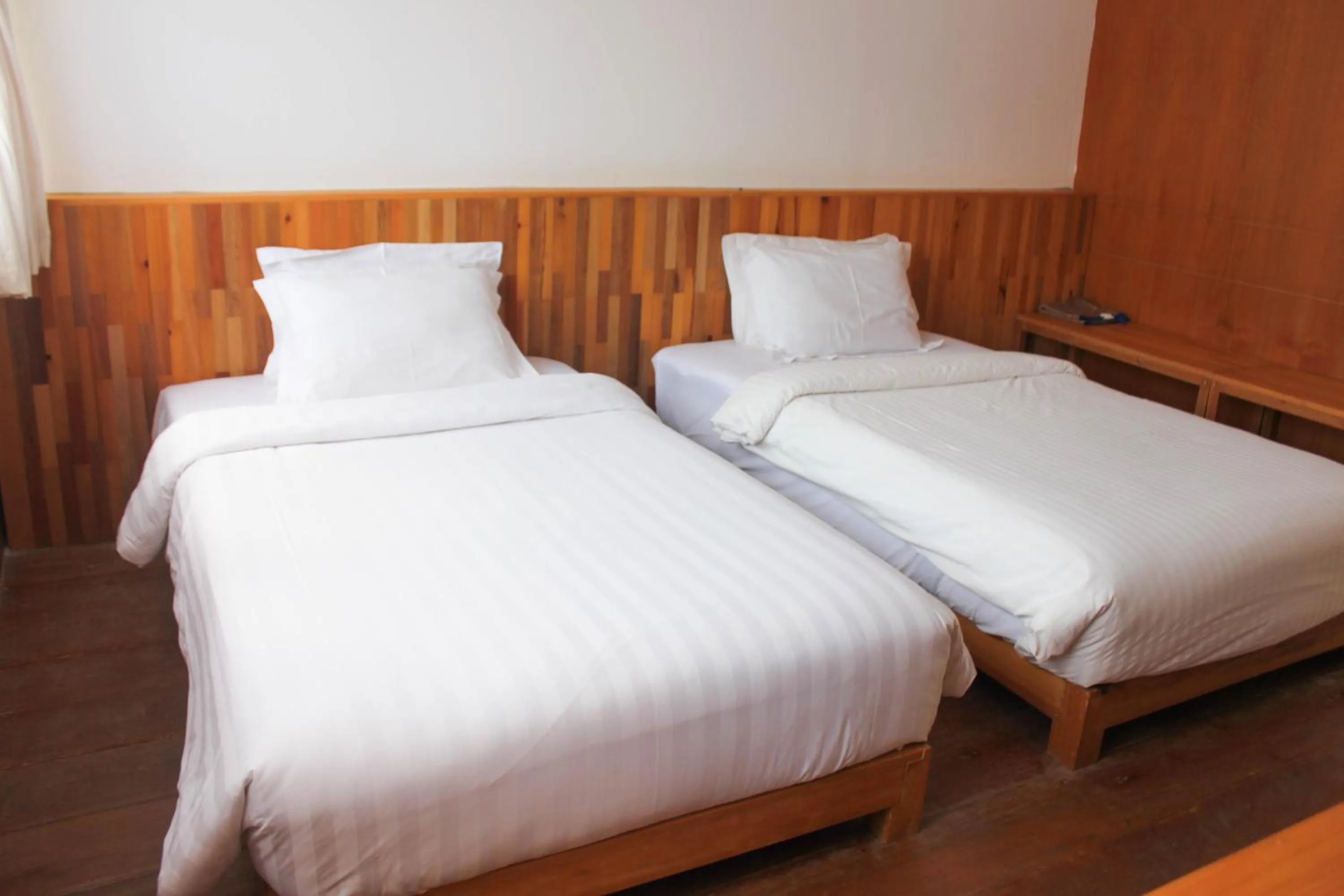 Bed in Natuna Dive Resort