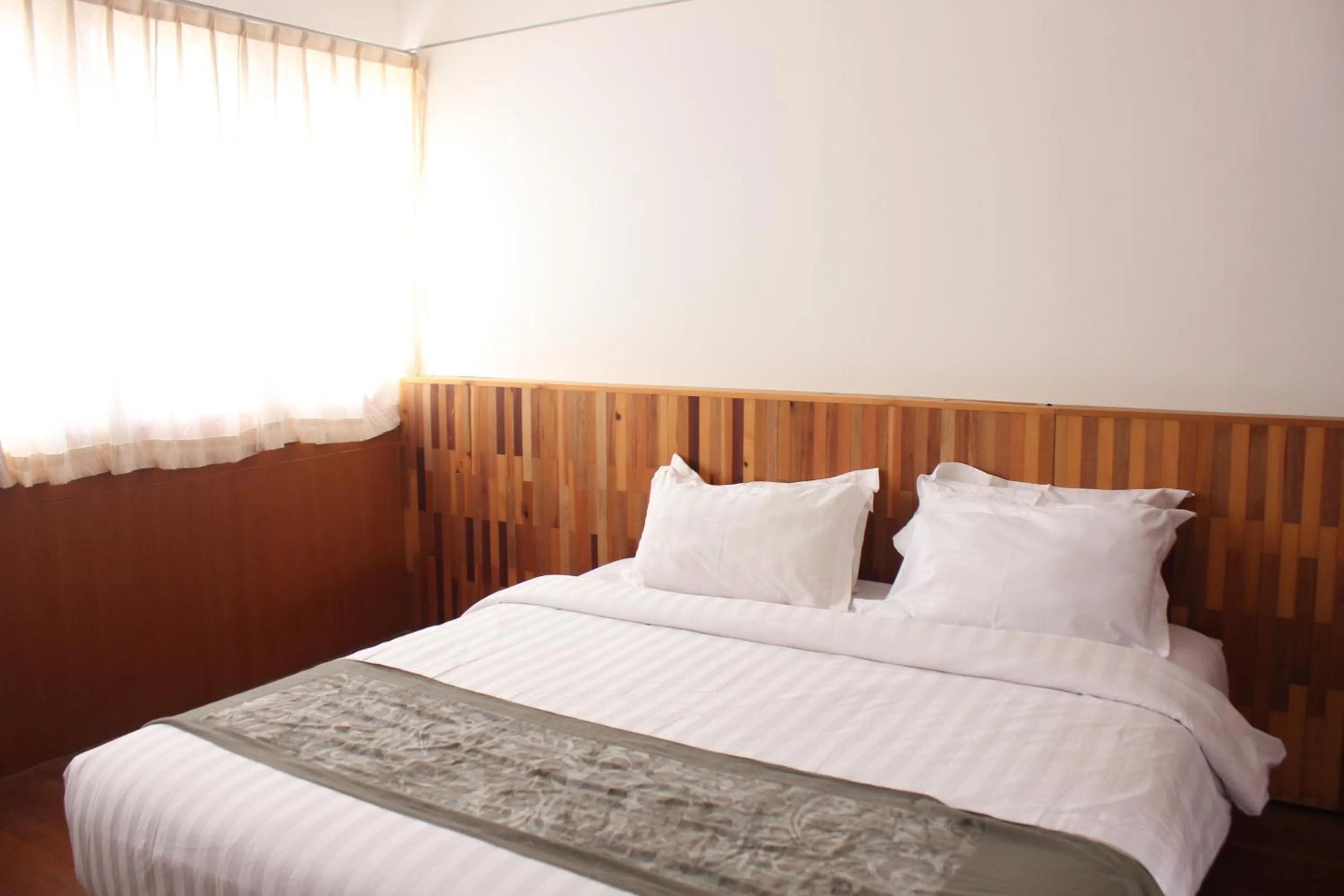 Bed in Natuna Dive Resort