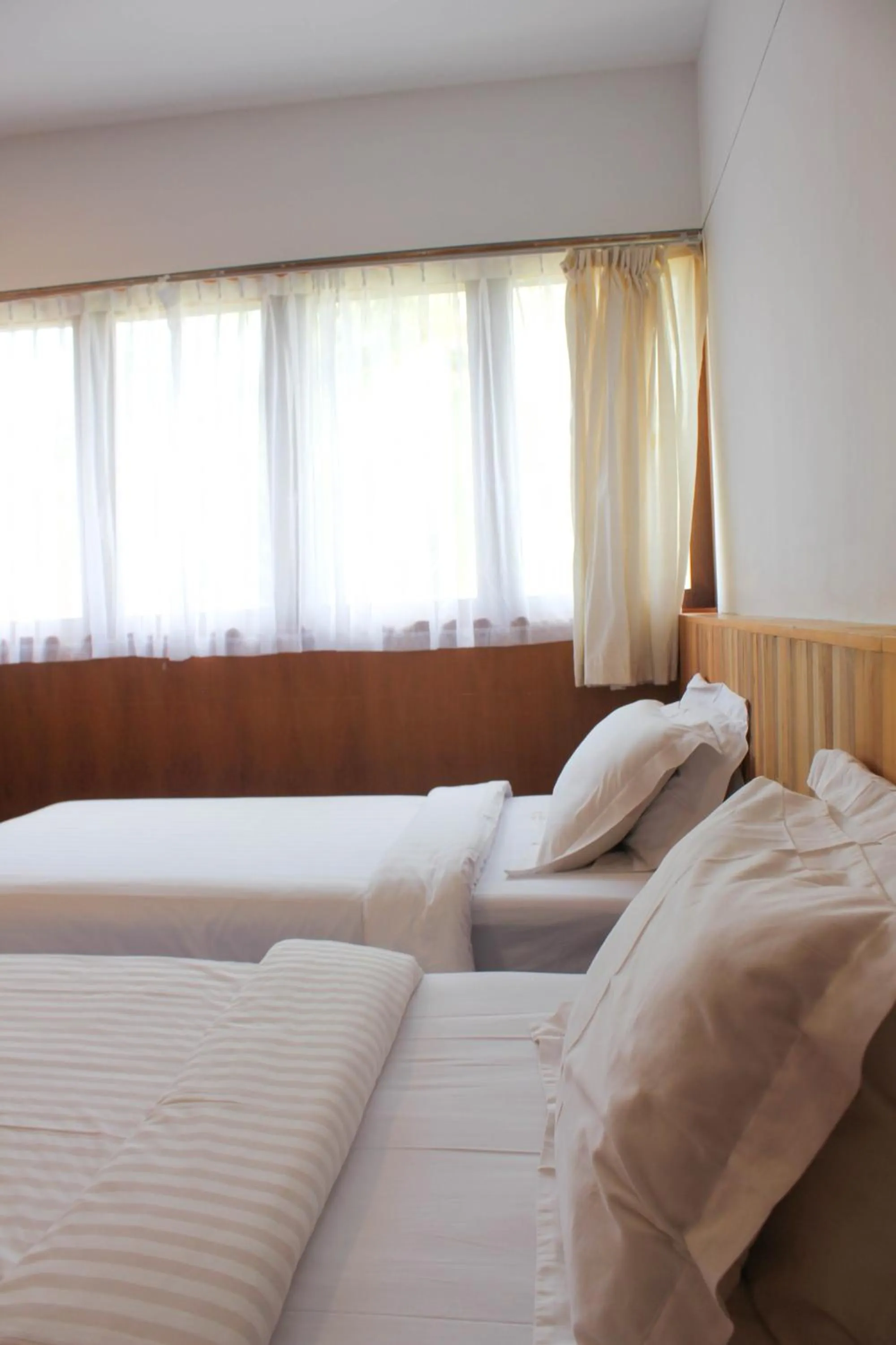 Bed in Natuna Dive Resort