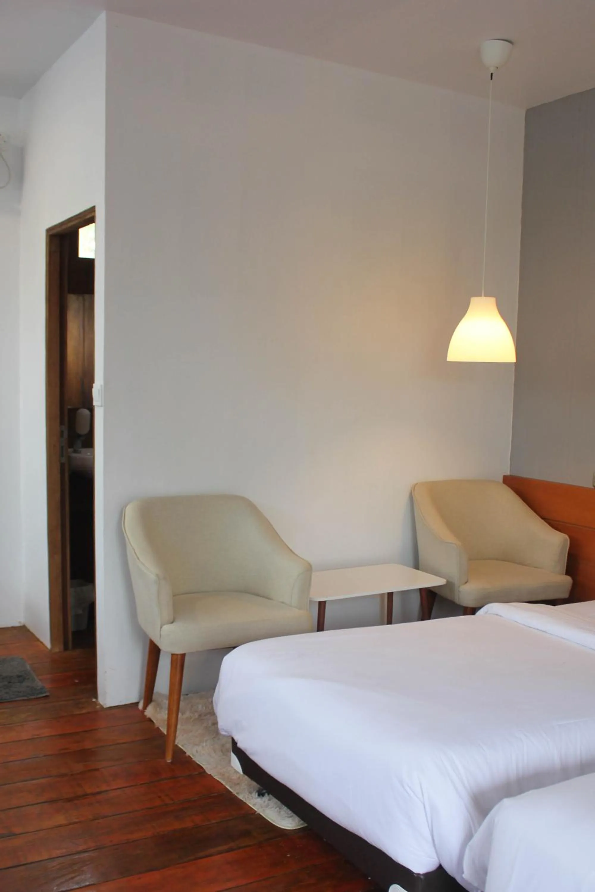 Seating area, Bed in Natuna Dive Resort