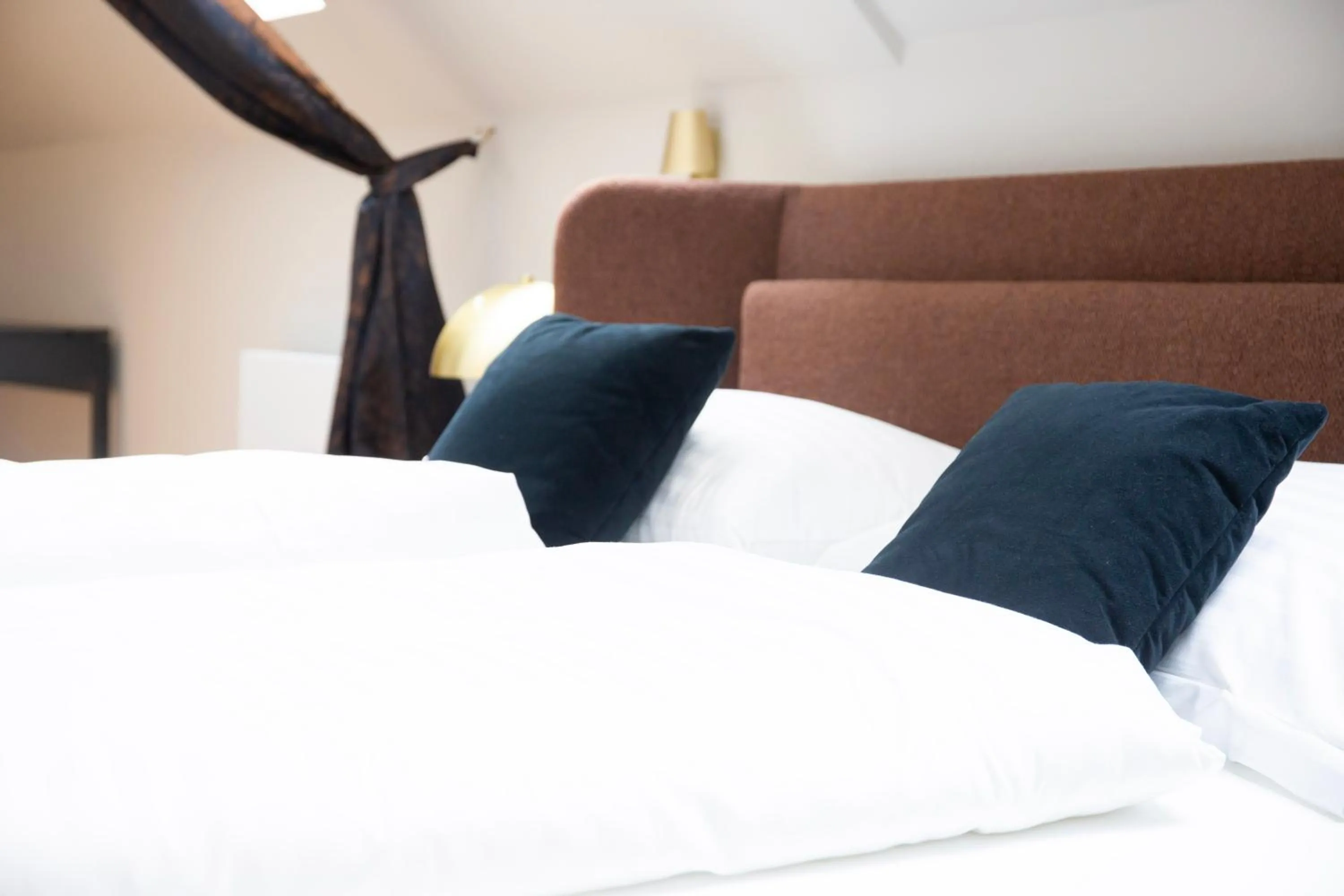 Bed in Blackhome Wien I contactless check-in