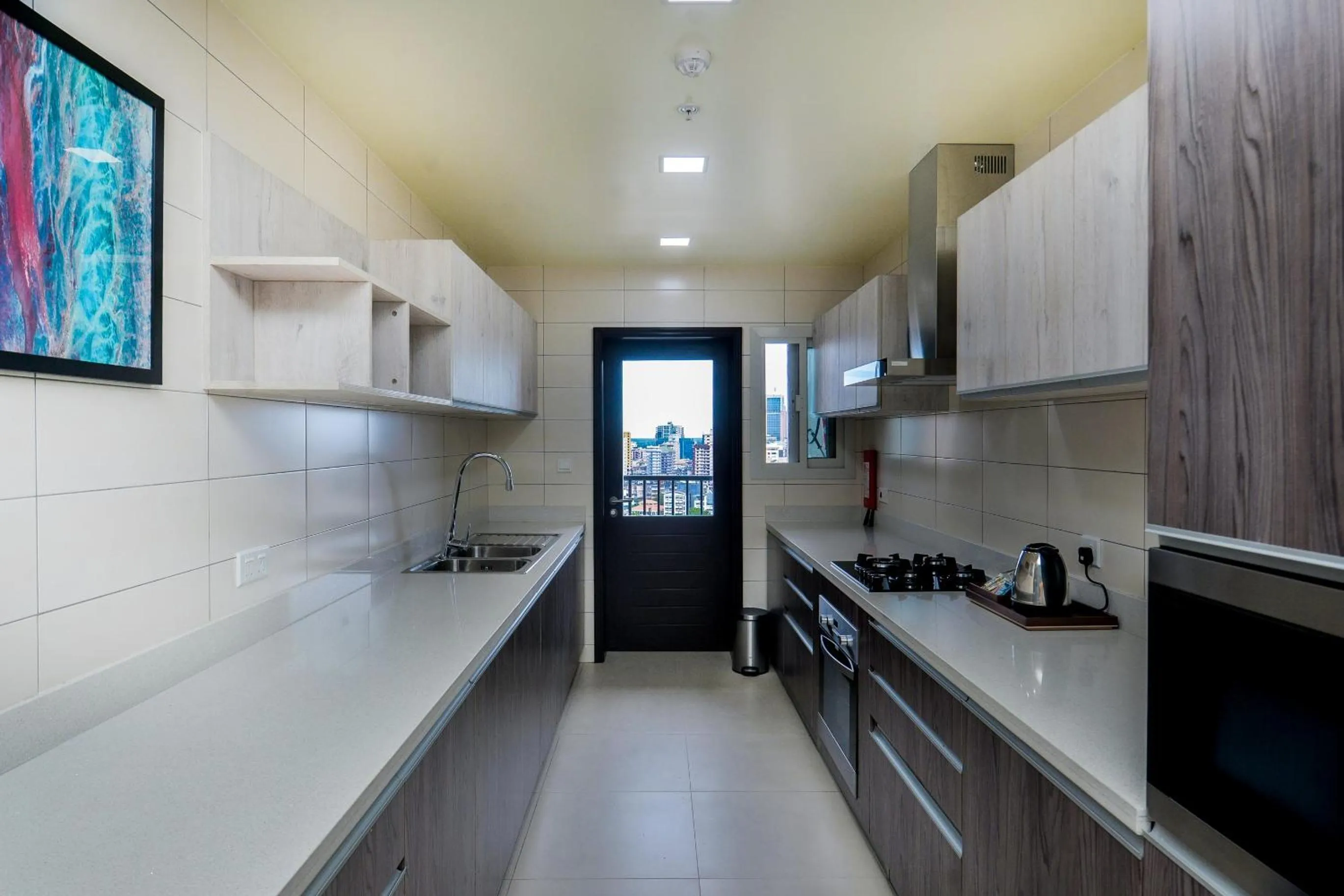 Kitchen or kitchenette in Aura Suites