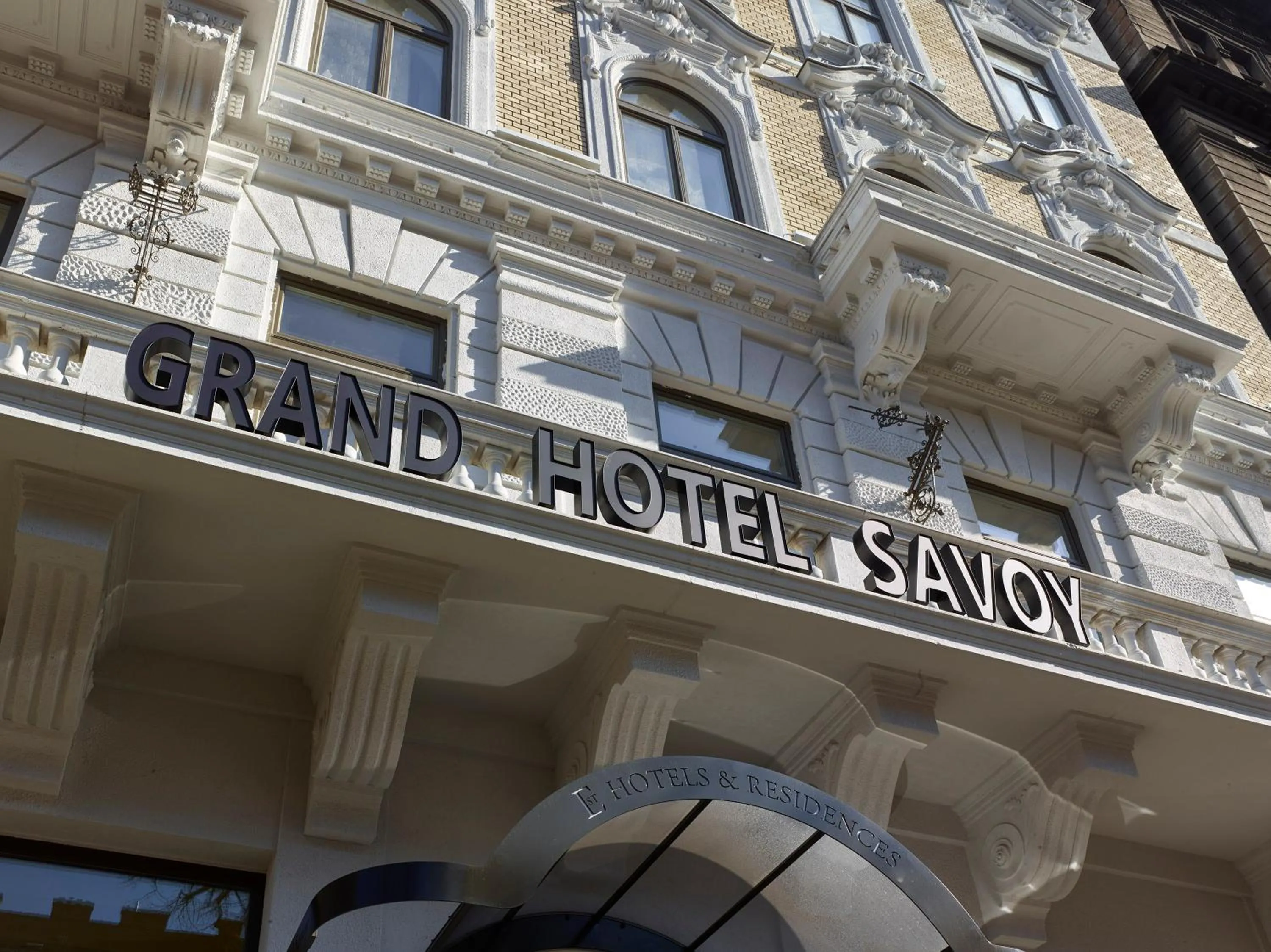 Property building in EST Grand Hotel Savoy