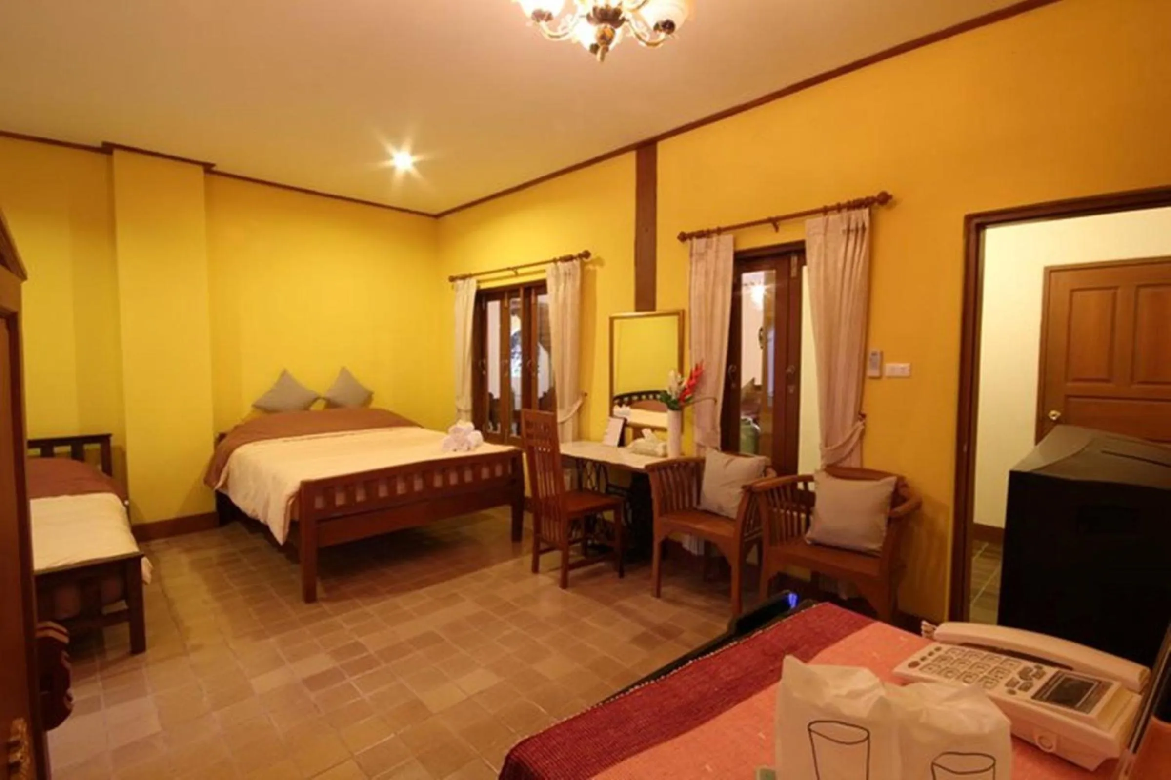 Photo of the whole room, Bed in Khum Khun Wang Resort