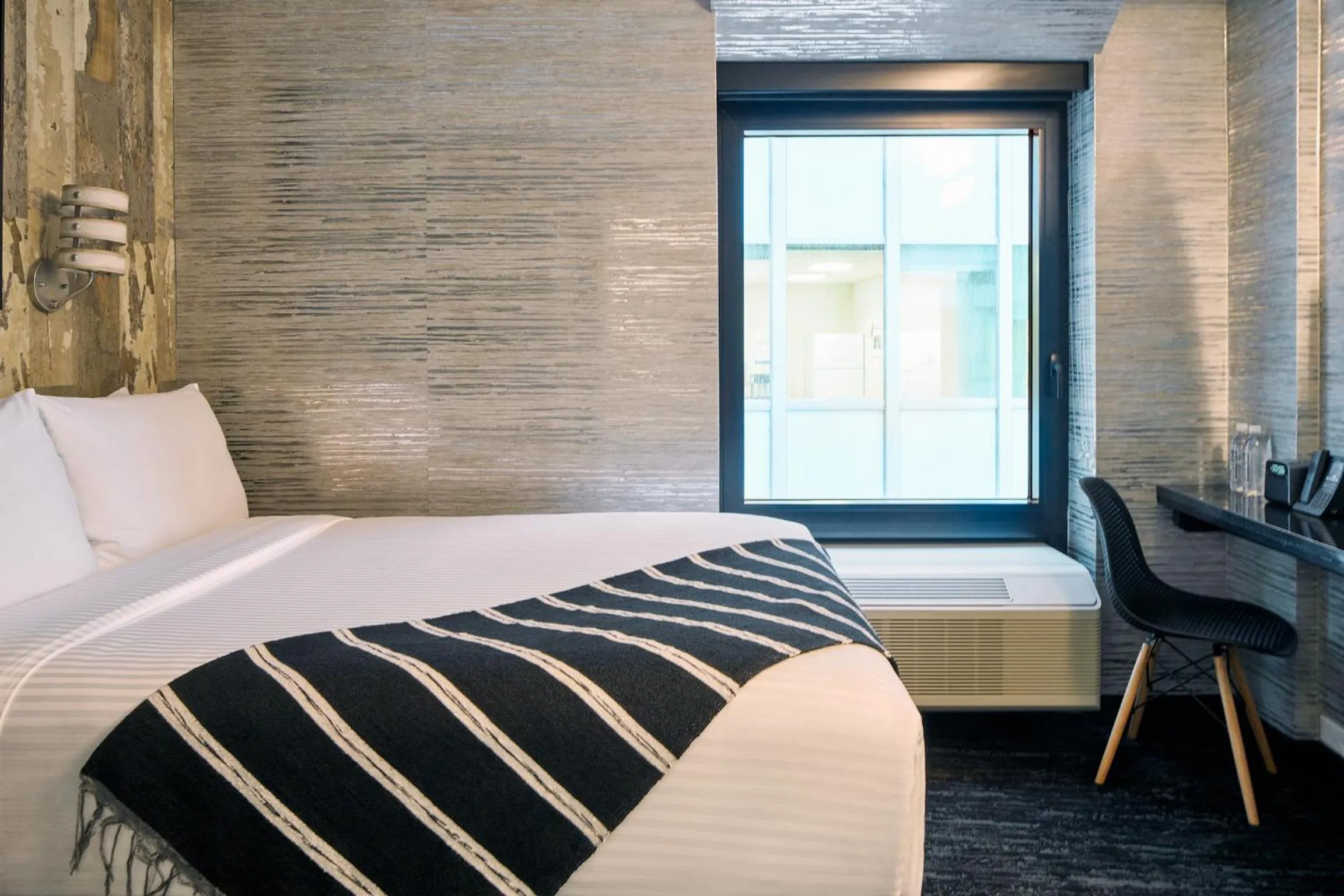 Bed in The FIDI Hotel