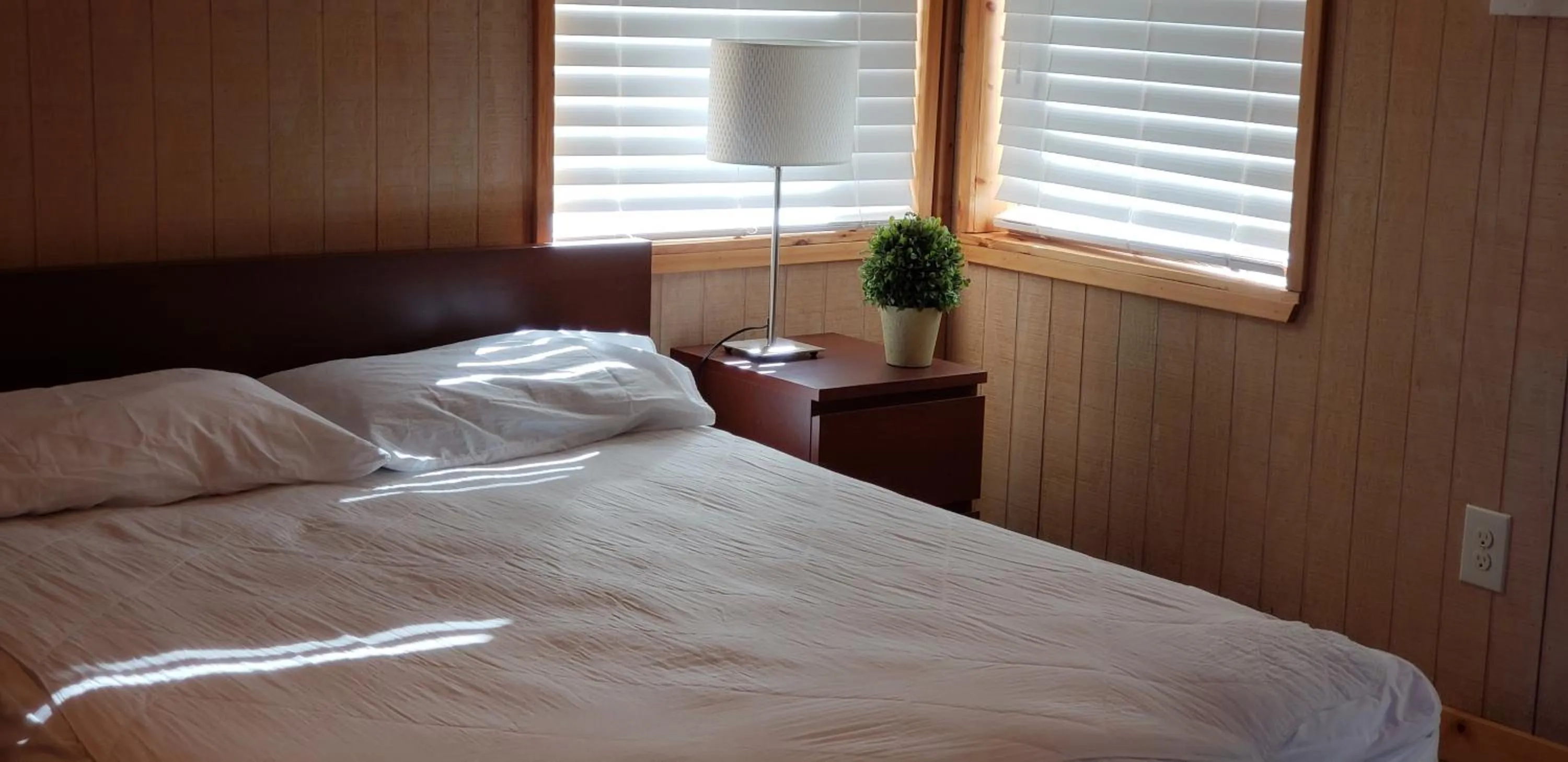 Bed in Seven Bluff Cabins