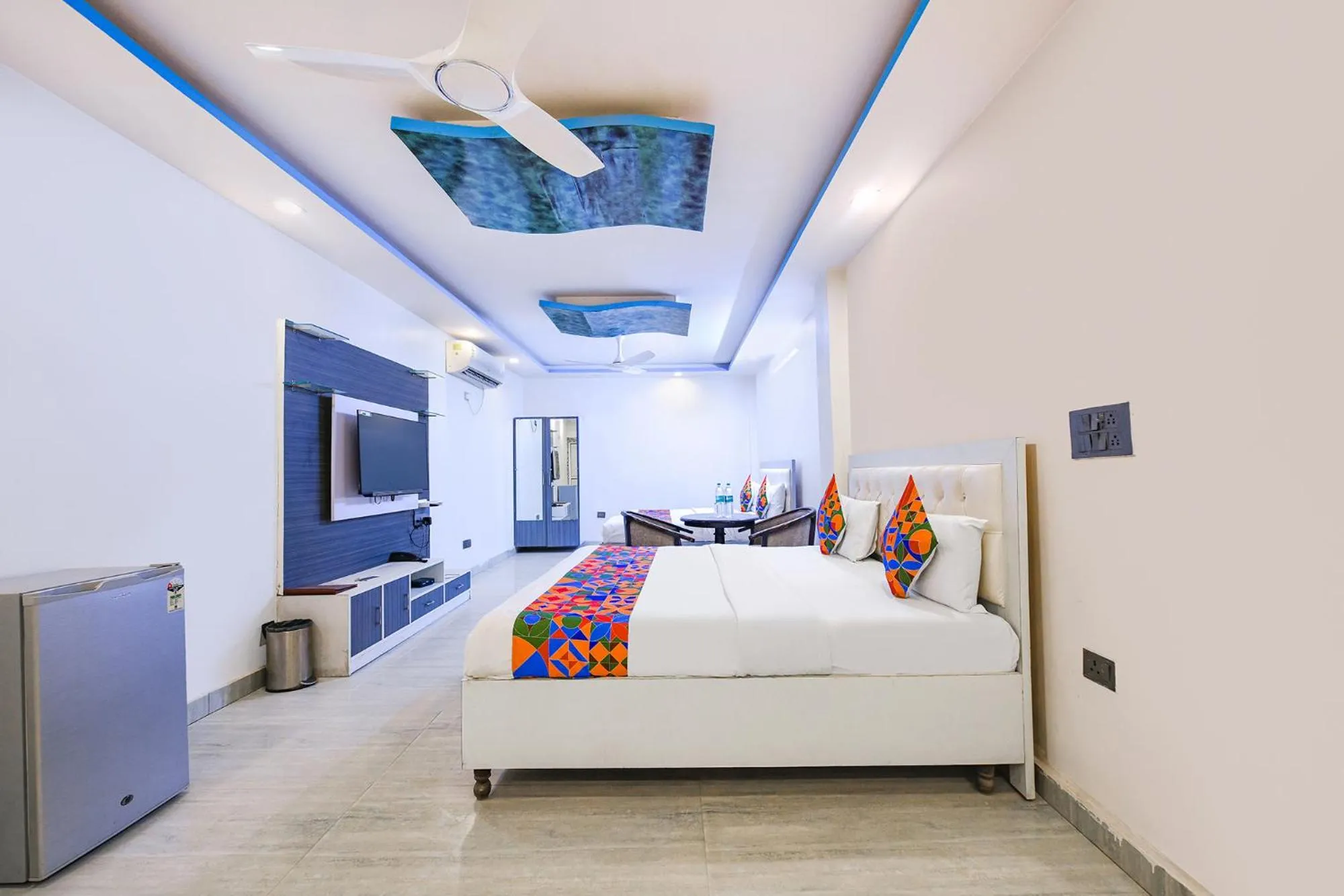 Bed in FabHotel Capital Inn