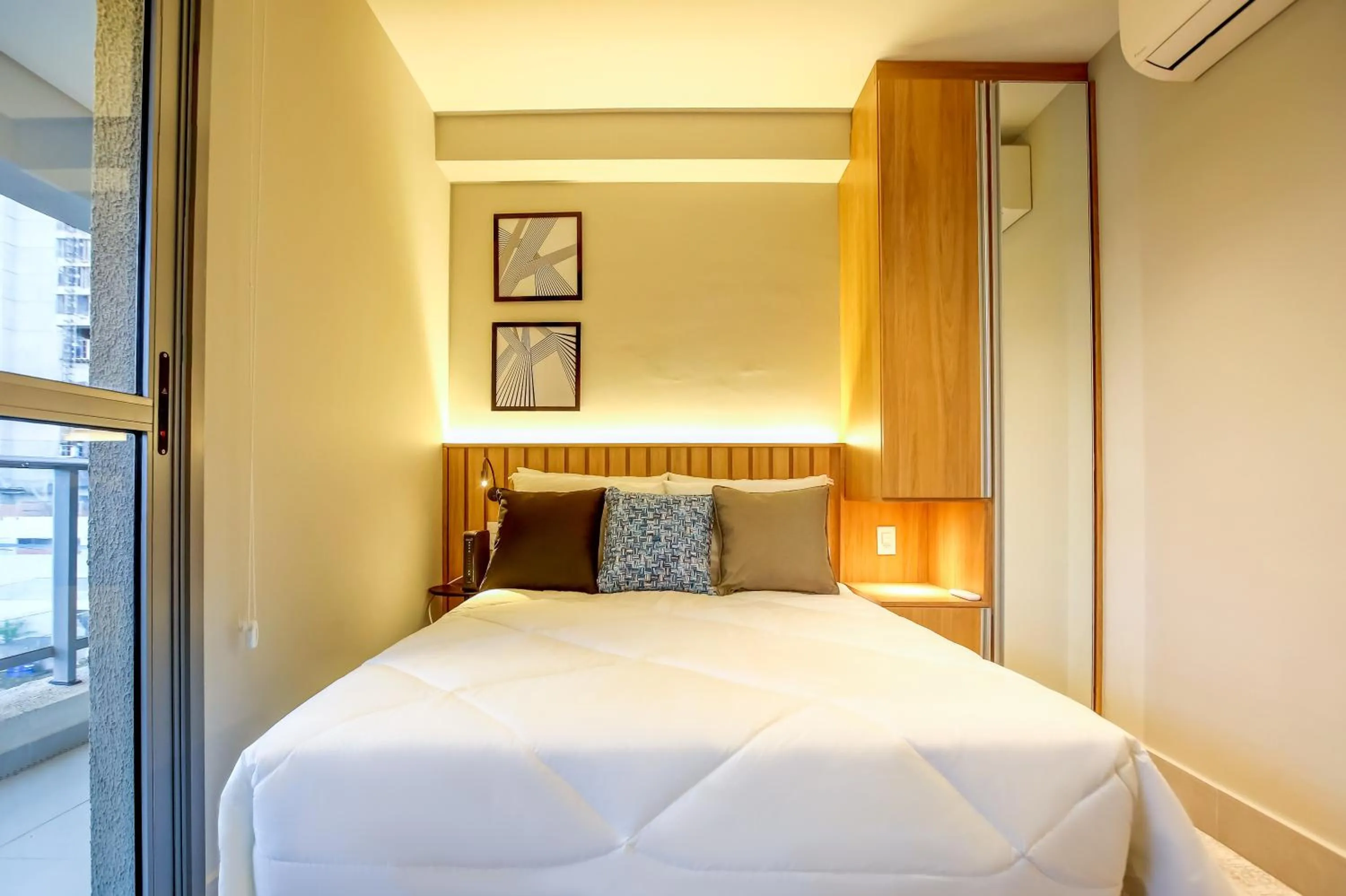 Bed in Roomo Butantã Rebouças