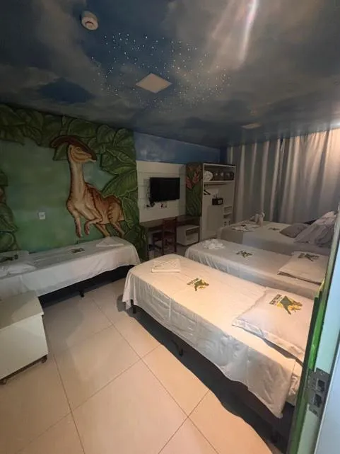 Bed in Hotel Recanto dos Dinossauros